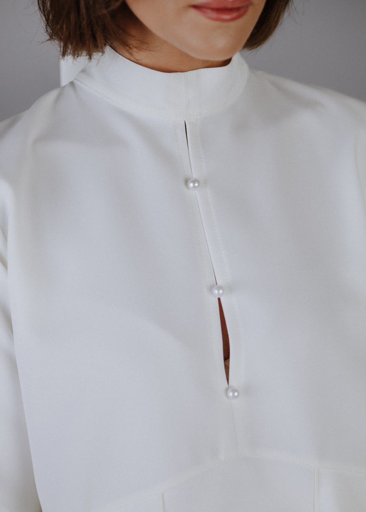 Curly frilly top in ecru