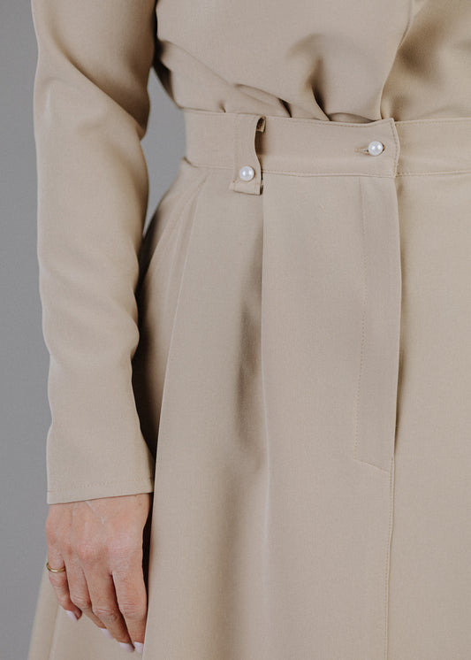 ZSEBES SZOKNYA VILÁGOS TAUPE SZÍNBEN