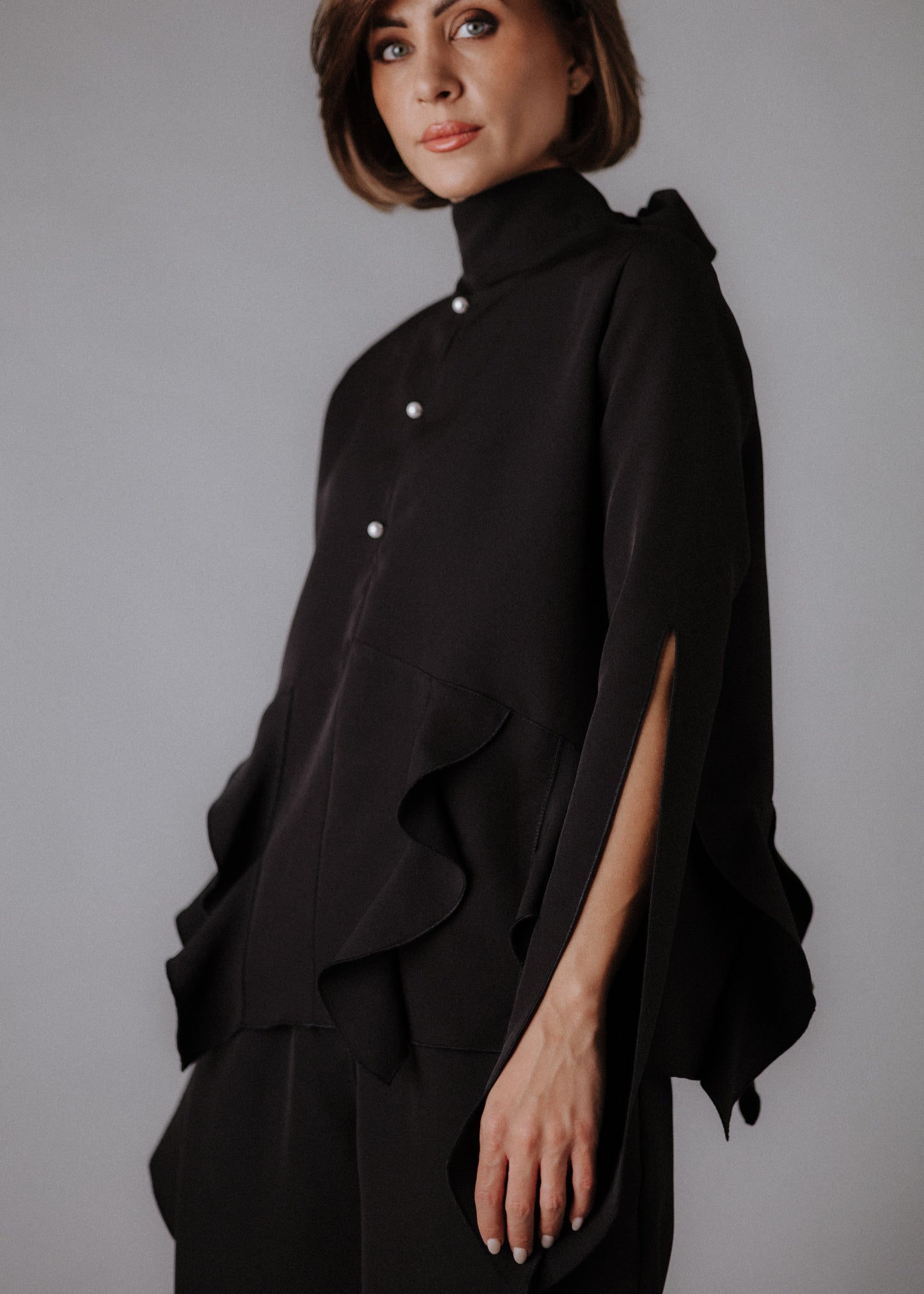 Fine fabric with top curls in black