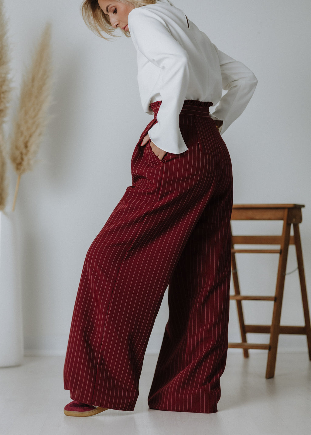 Limited edition striped fabric trousers in dark burgundy