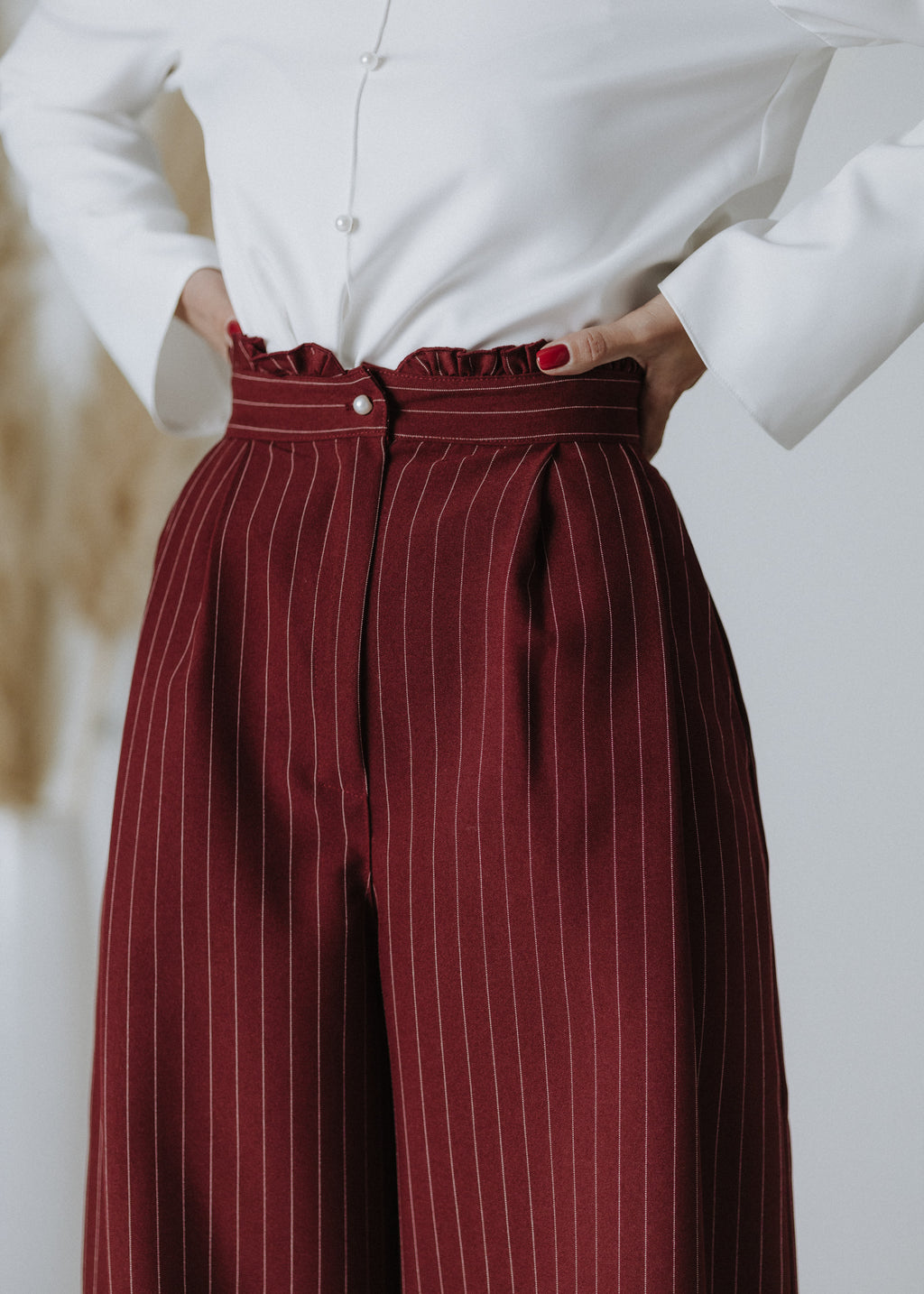 Limited edition striped fabric trousers in dark burgundy