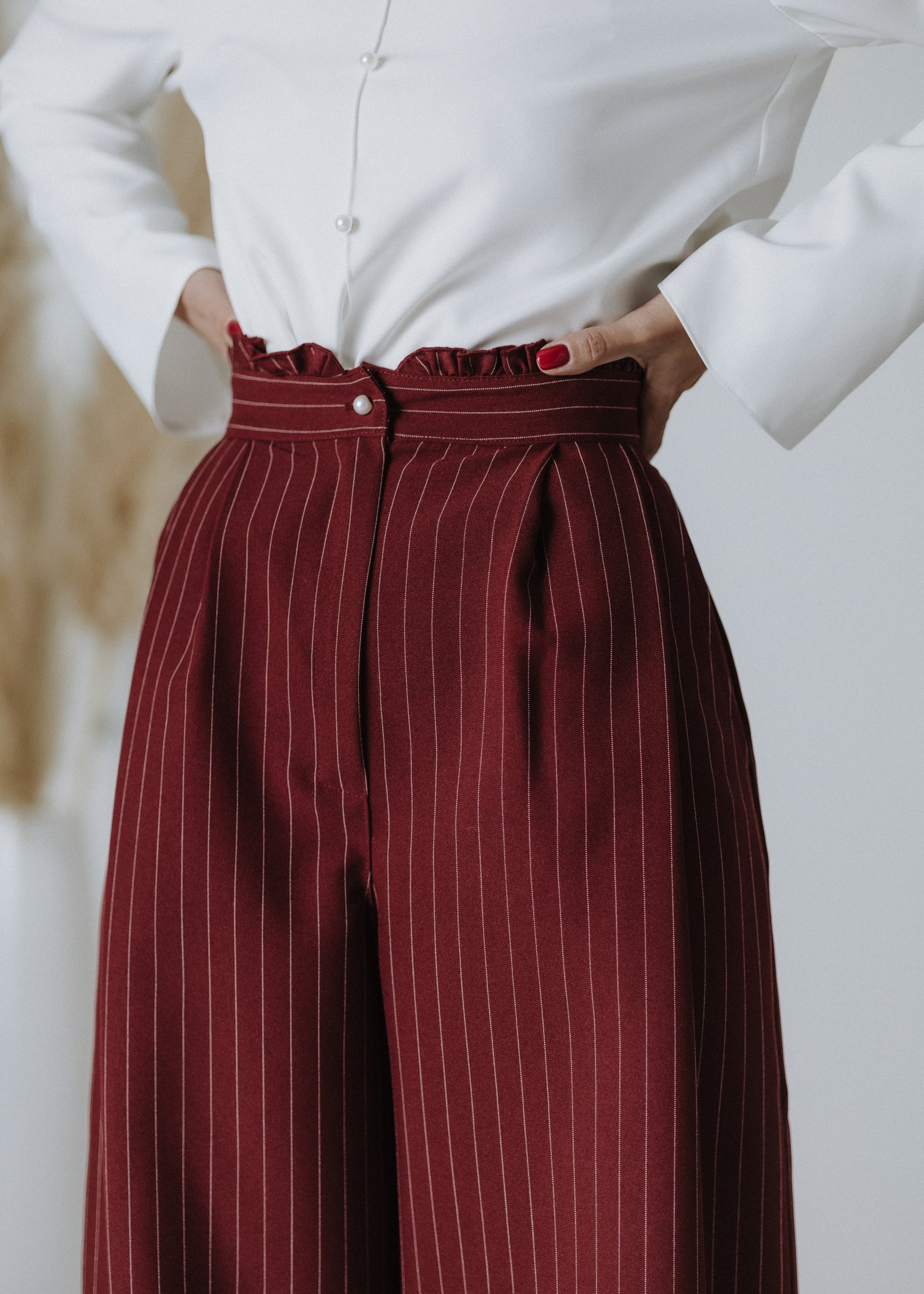 Limited edition striped fabric trousers in dark burgundy