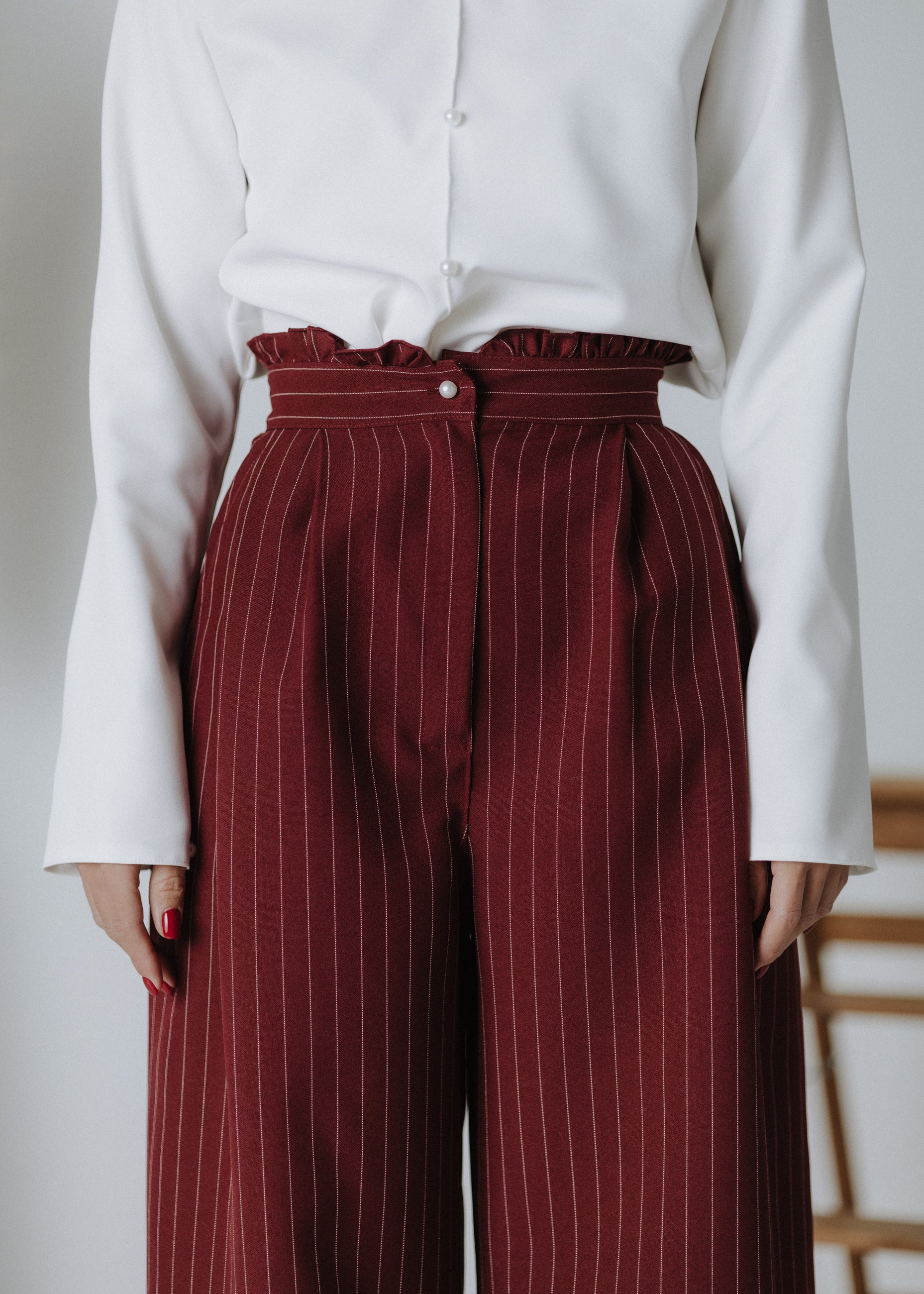 Limited edition striped fabric trousers in dark burgundy