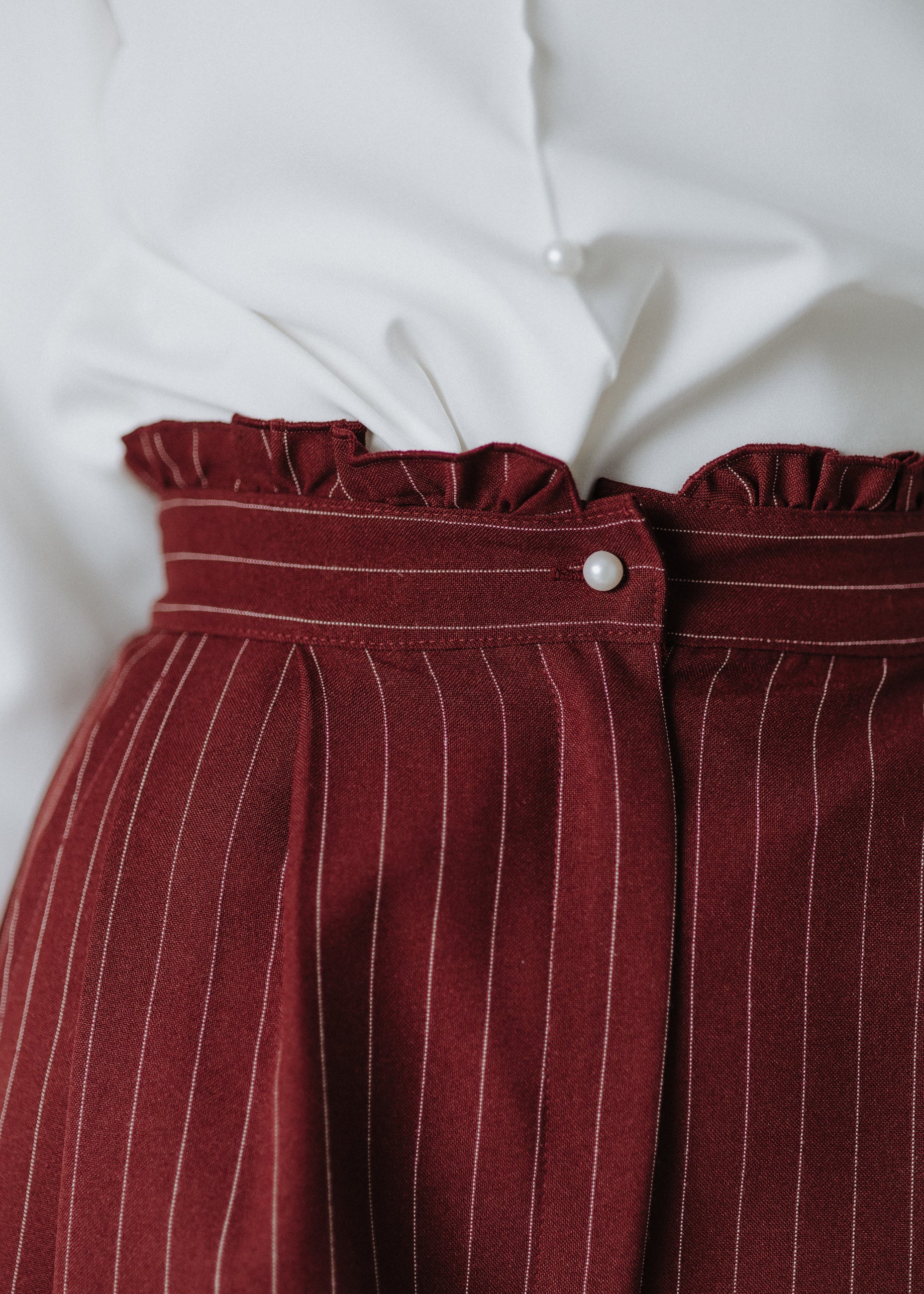 Limited edition striped fabric trousers in dark burgundy