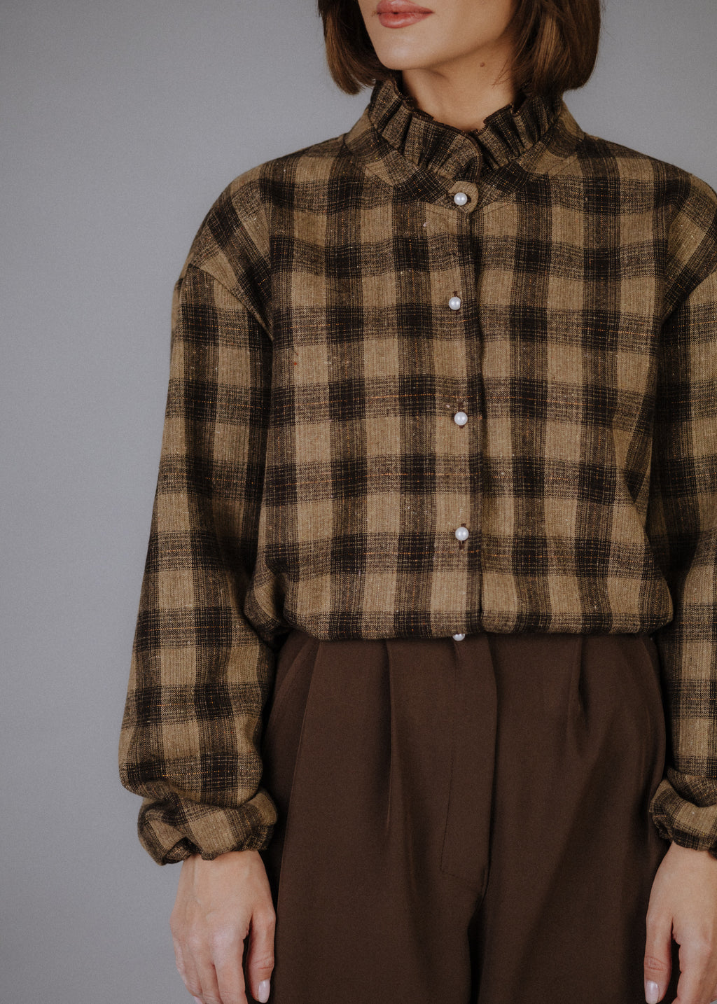 Wool blend bomber jacket with dark brown check pattern