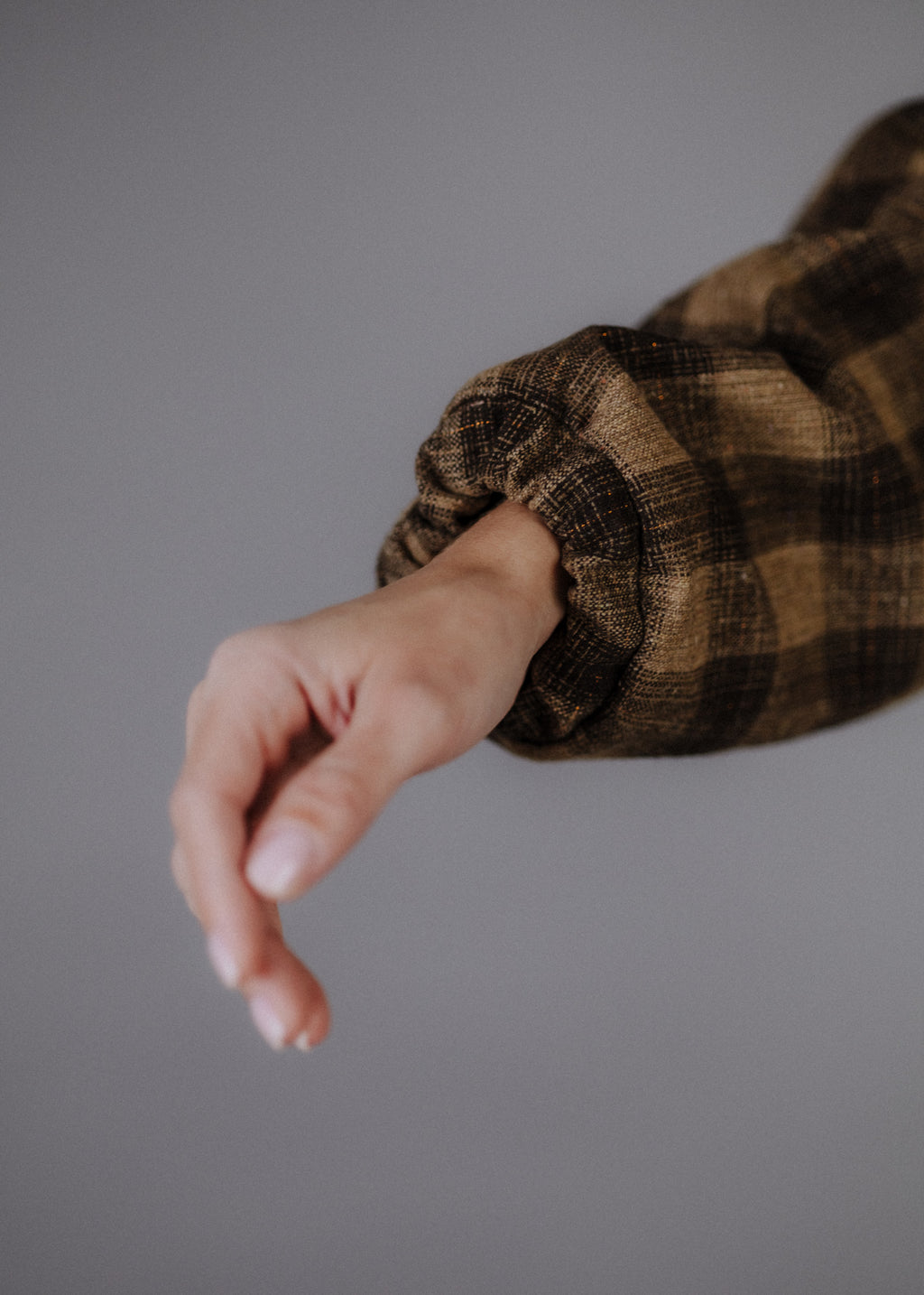 Wool blend bomber jacket with dark brown check pattern