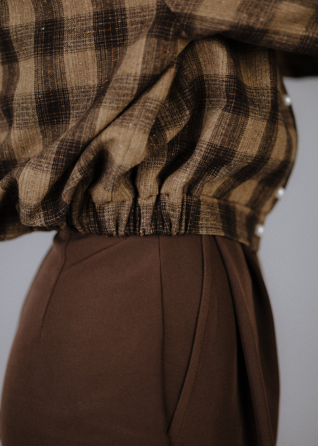 Wool blend bomber jacket with dark brown check pattern