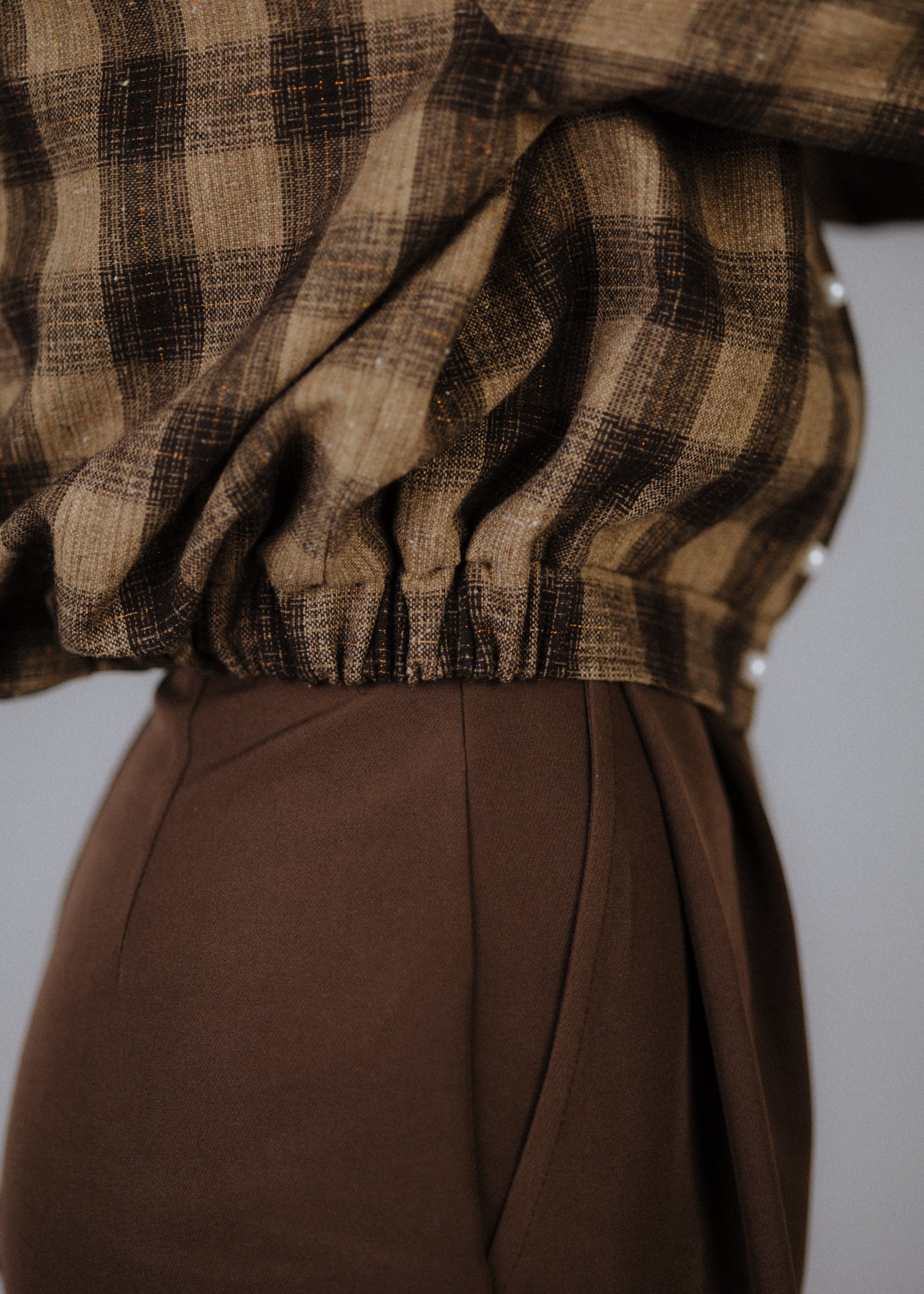 Wool blend bomber jacket with dark brown check pattern