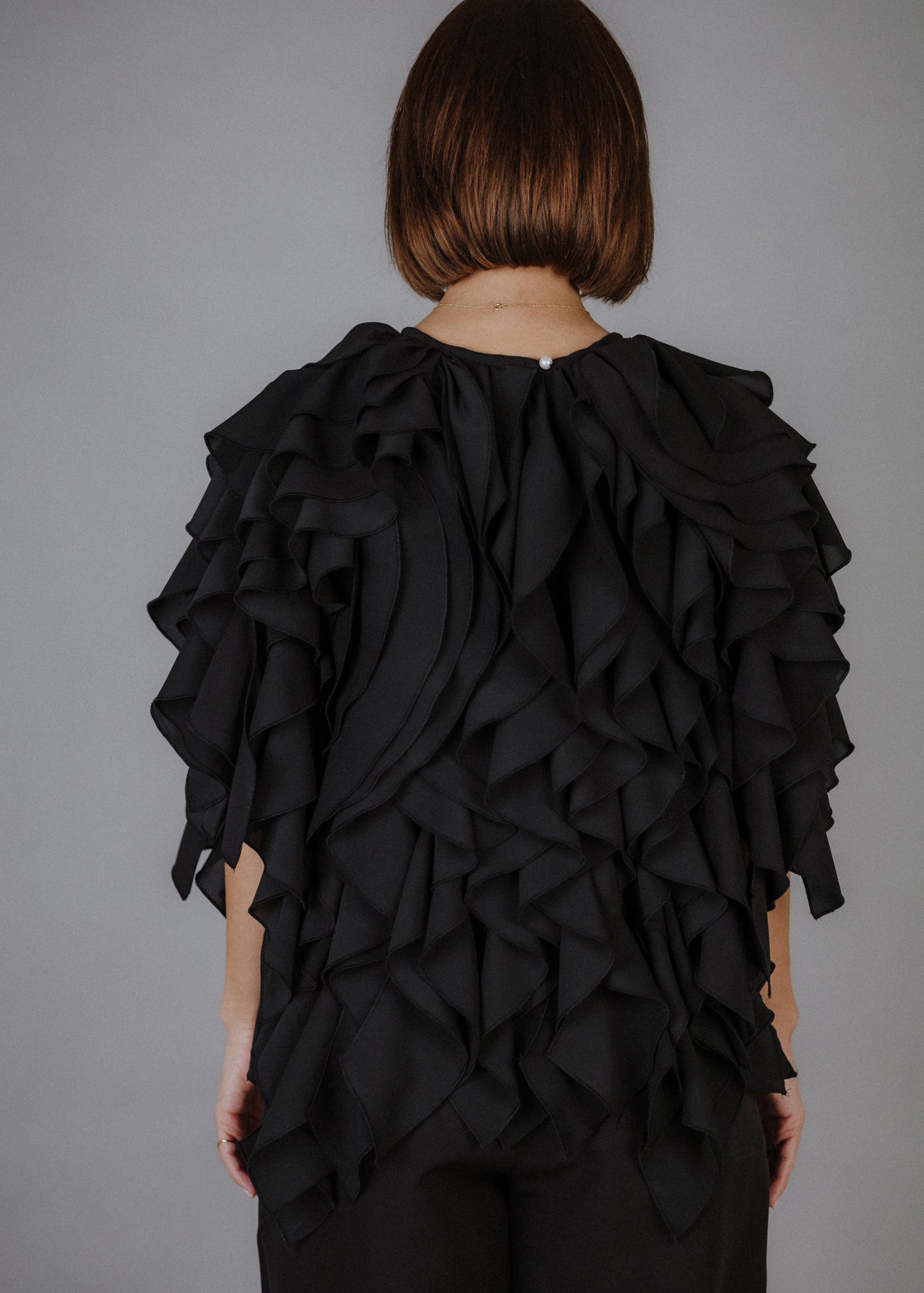 Curly ruffled muslin top