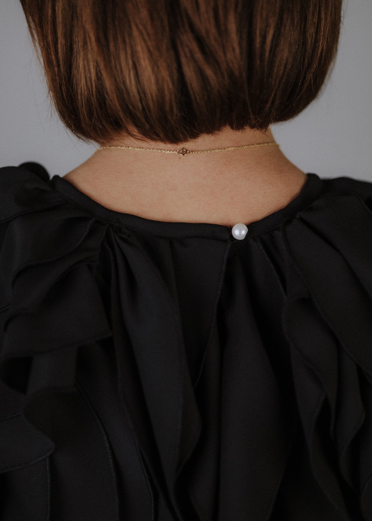 Curly ruffled muslin top