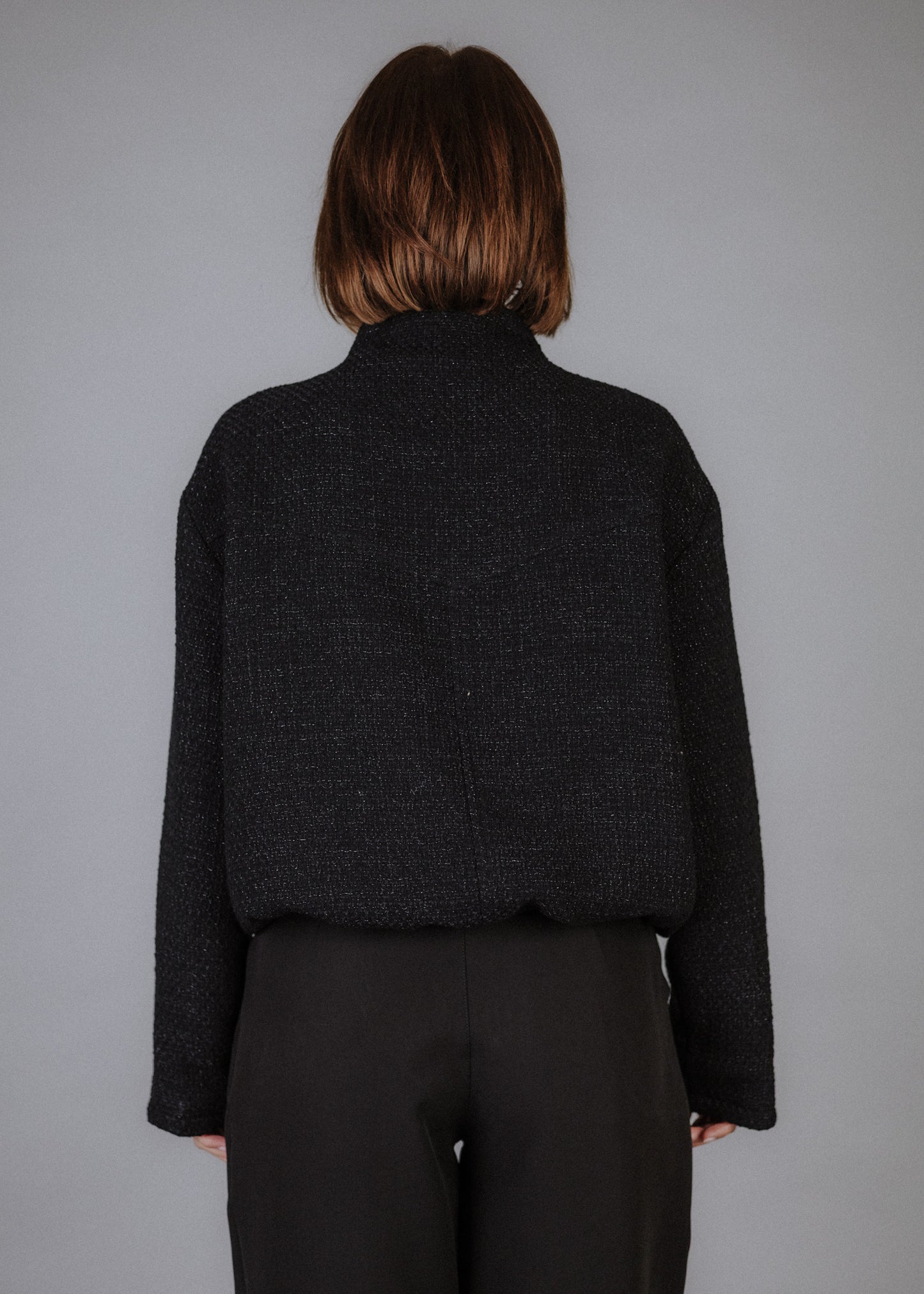 Boucle bomber jacket in black