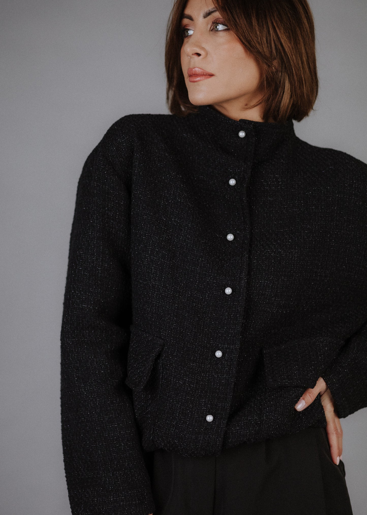 Boucle bomber jacket in black