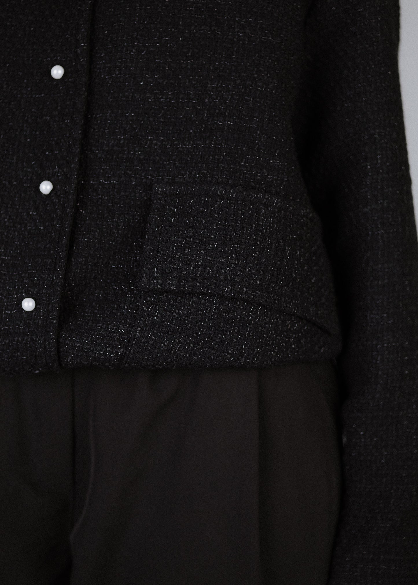 Boucle bomber jacket in black