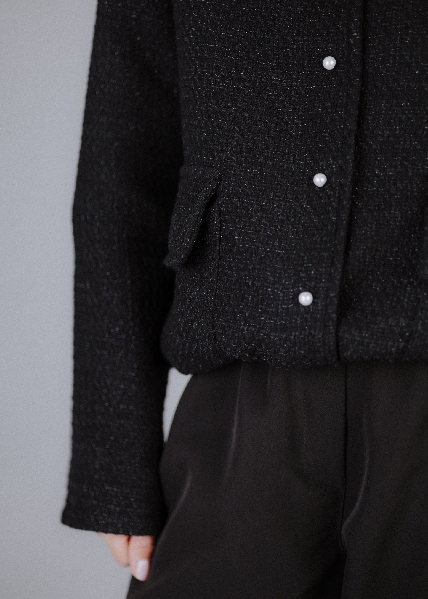 Boucle bomber jacket in black