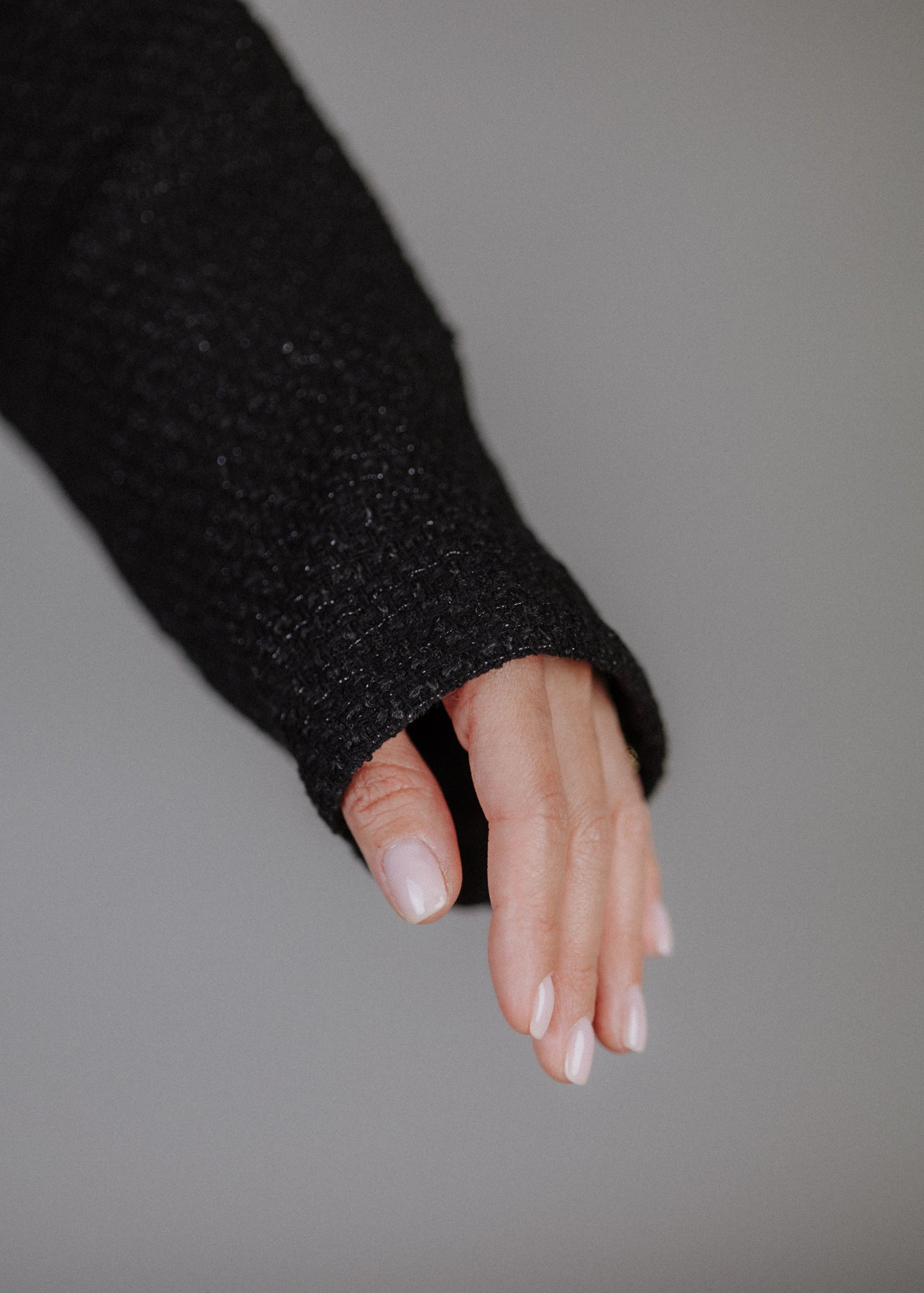 Boucle bomber jacket in black