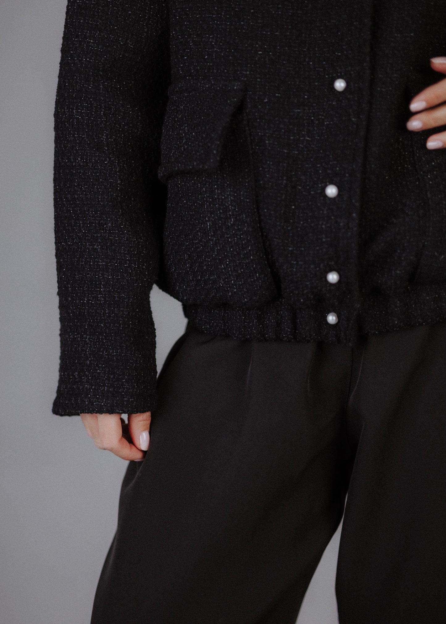 Boucle bomber jacket in black
