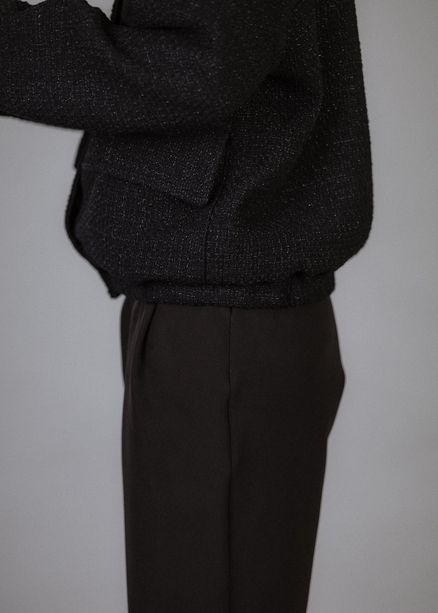 Boucle bomber jacket in black