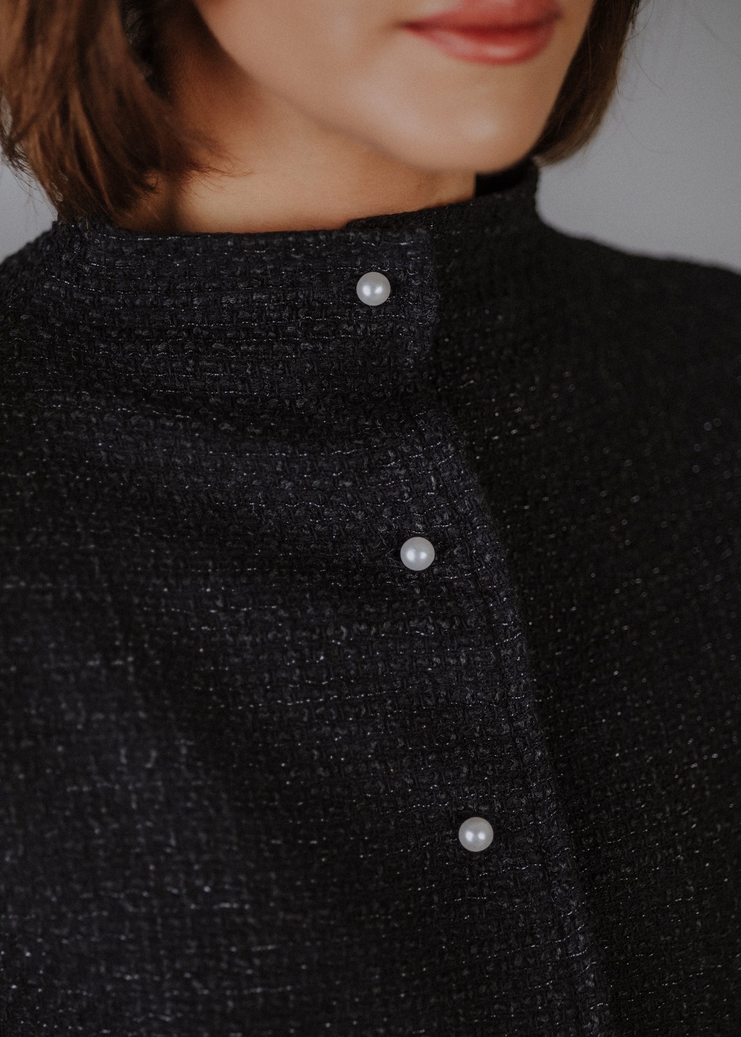 Boucle bomber jacket in black