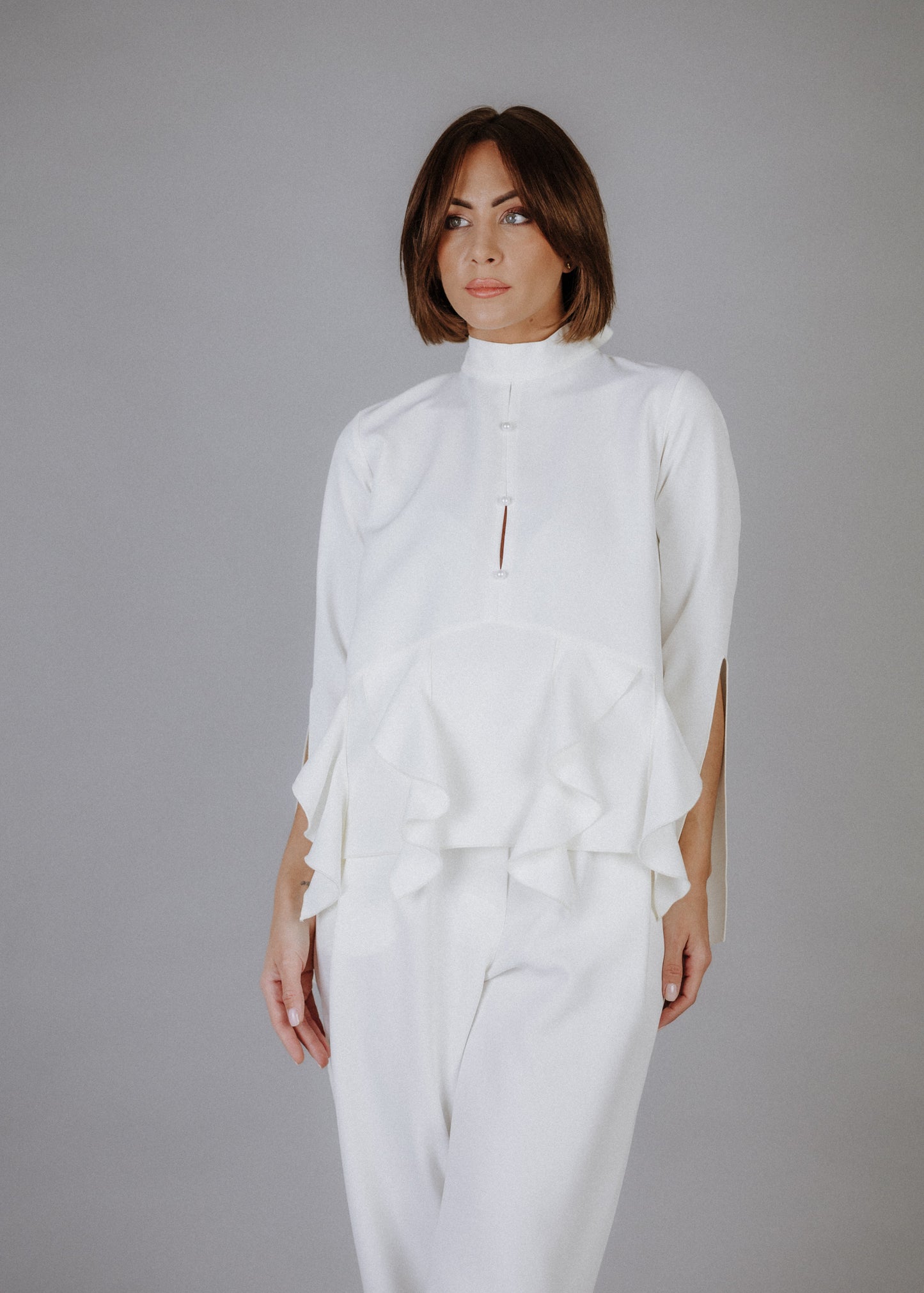 Curly frilly top in ecru