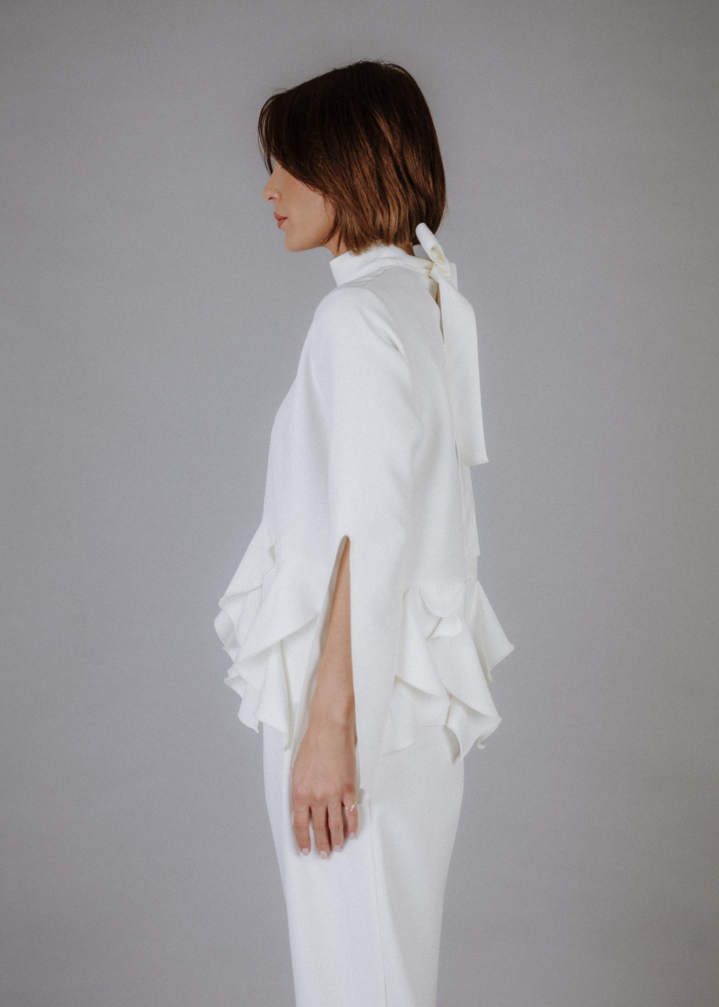 Curly frilly top in ecru