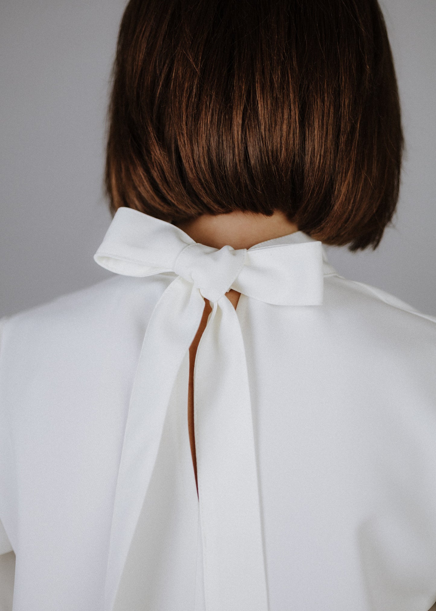 Curly frilly top in ecru