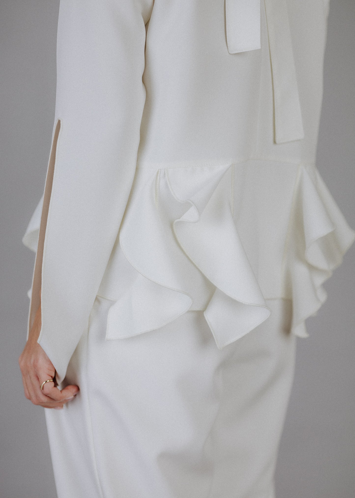 Curly frilly top in ecru