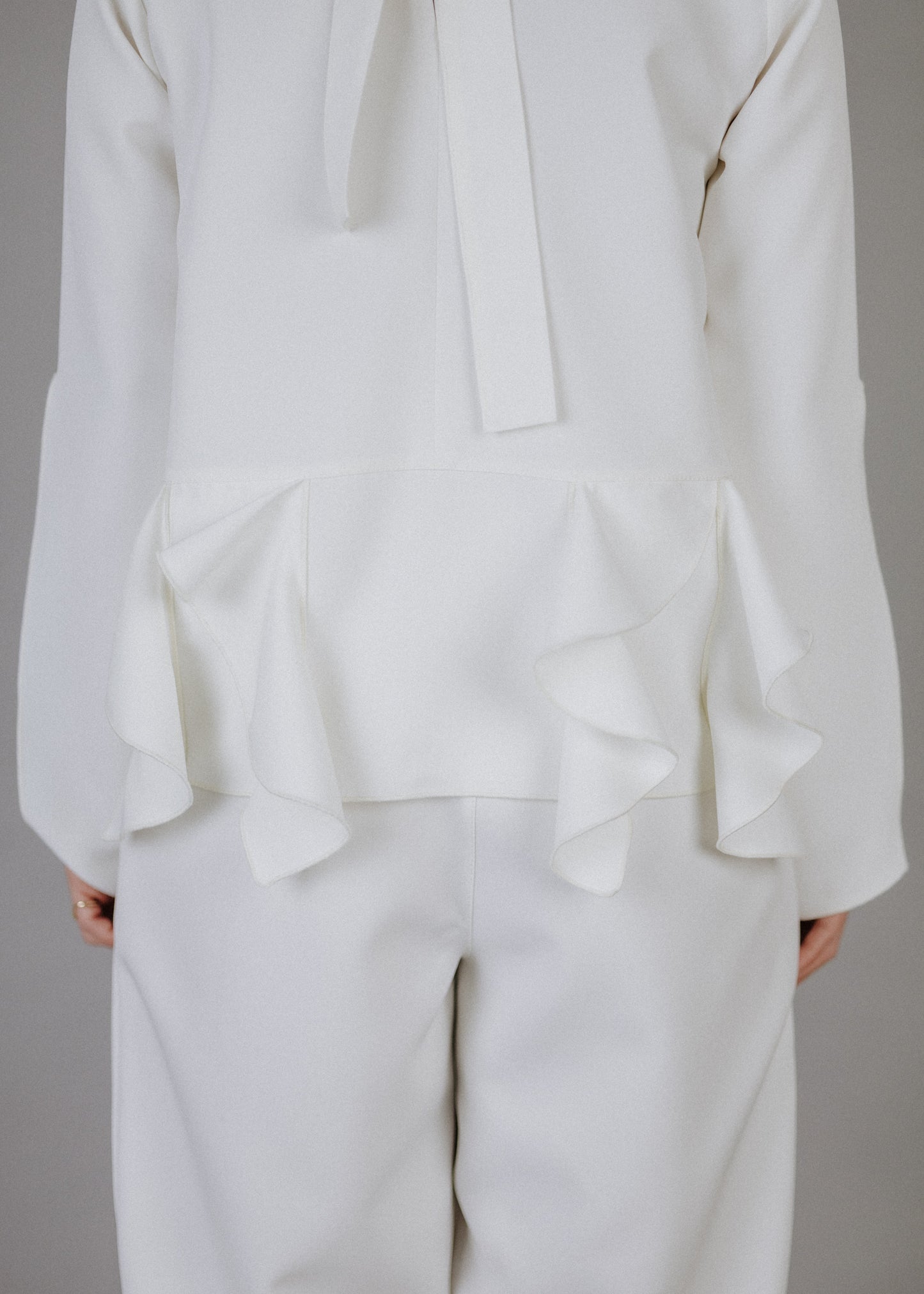 Curly frilly top in ecru