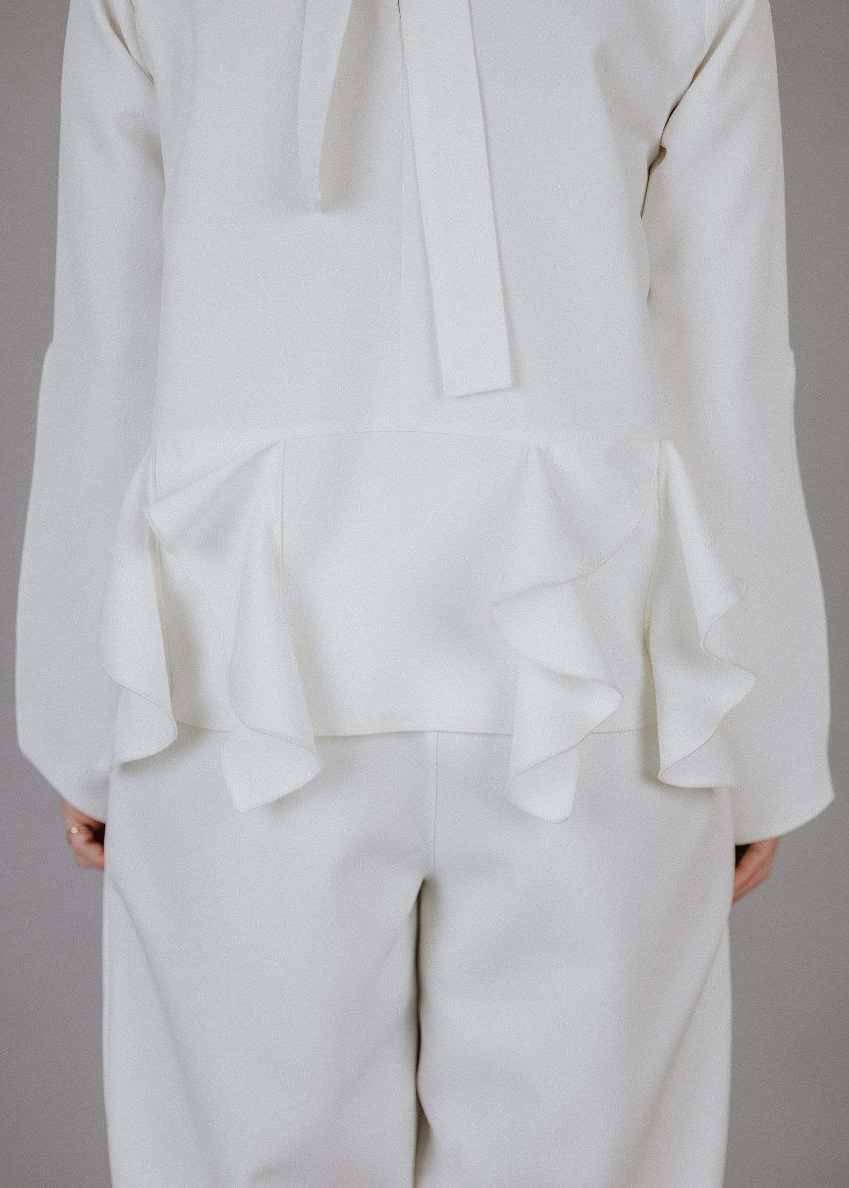 Curly frilly top in ecru