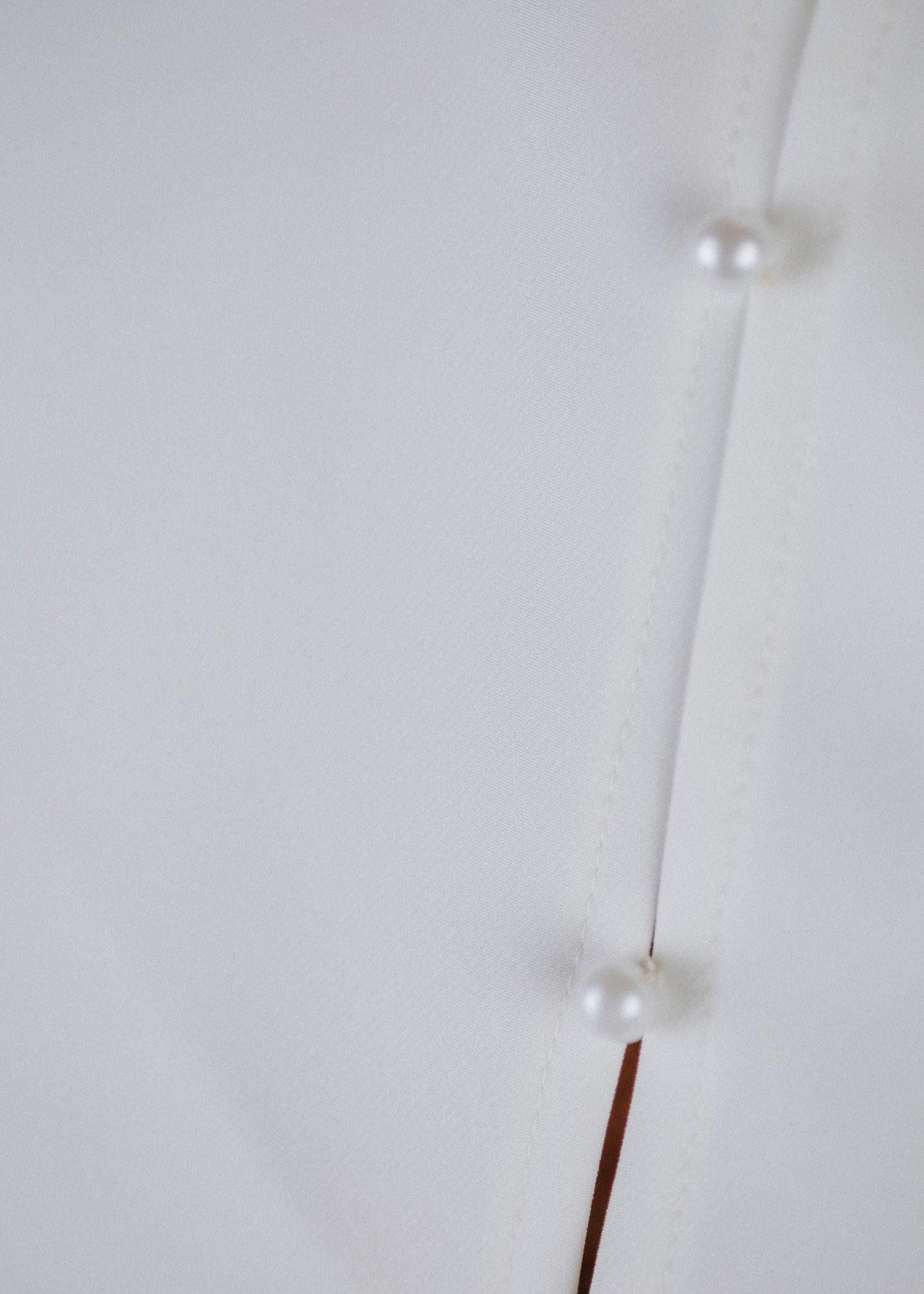 Curly frilly top in ecru