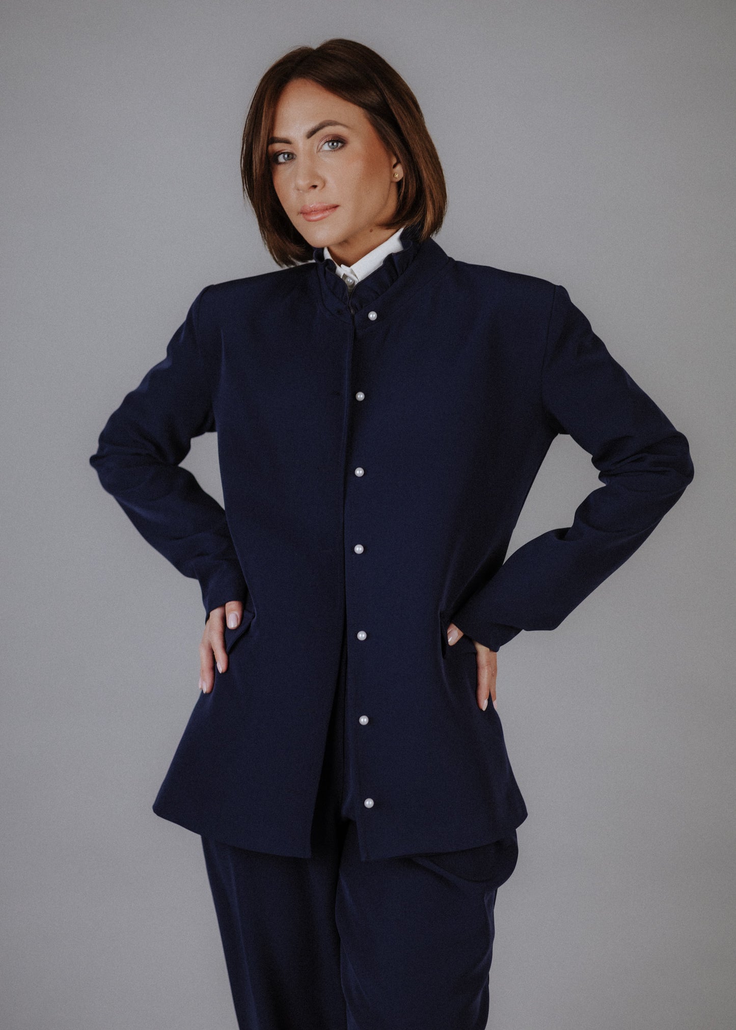 Ruffled collar jacket in navy blue