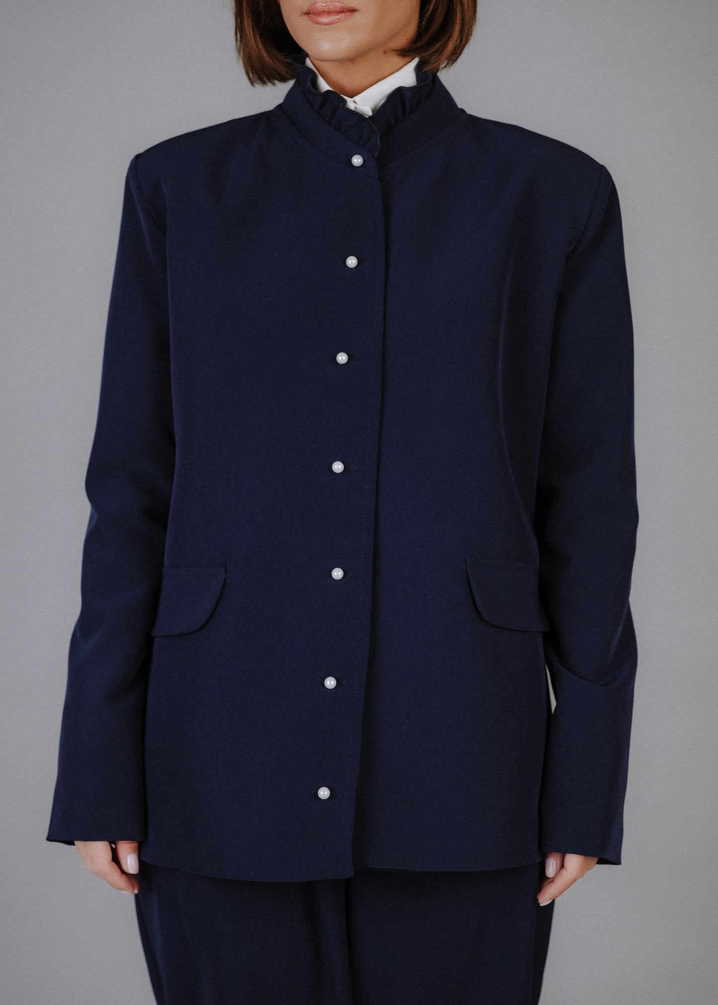 Ruffled collar jacket in navy blue