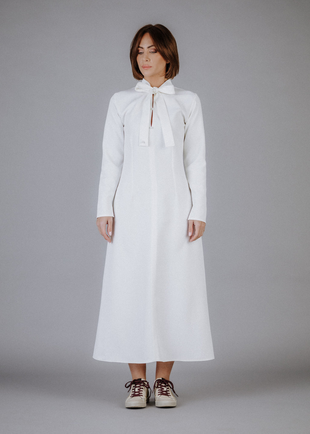 Fine fabric dress in ecru color