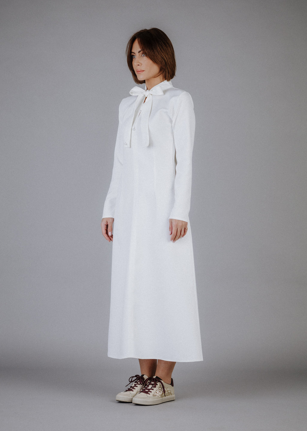 Fine fabric dress in ecru color