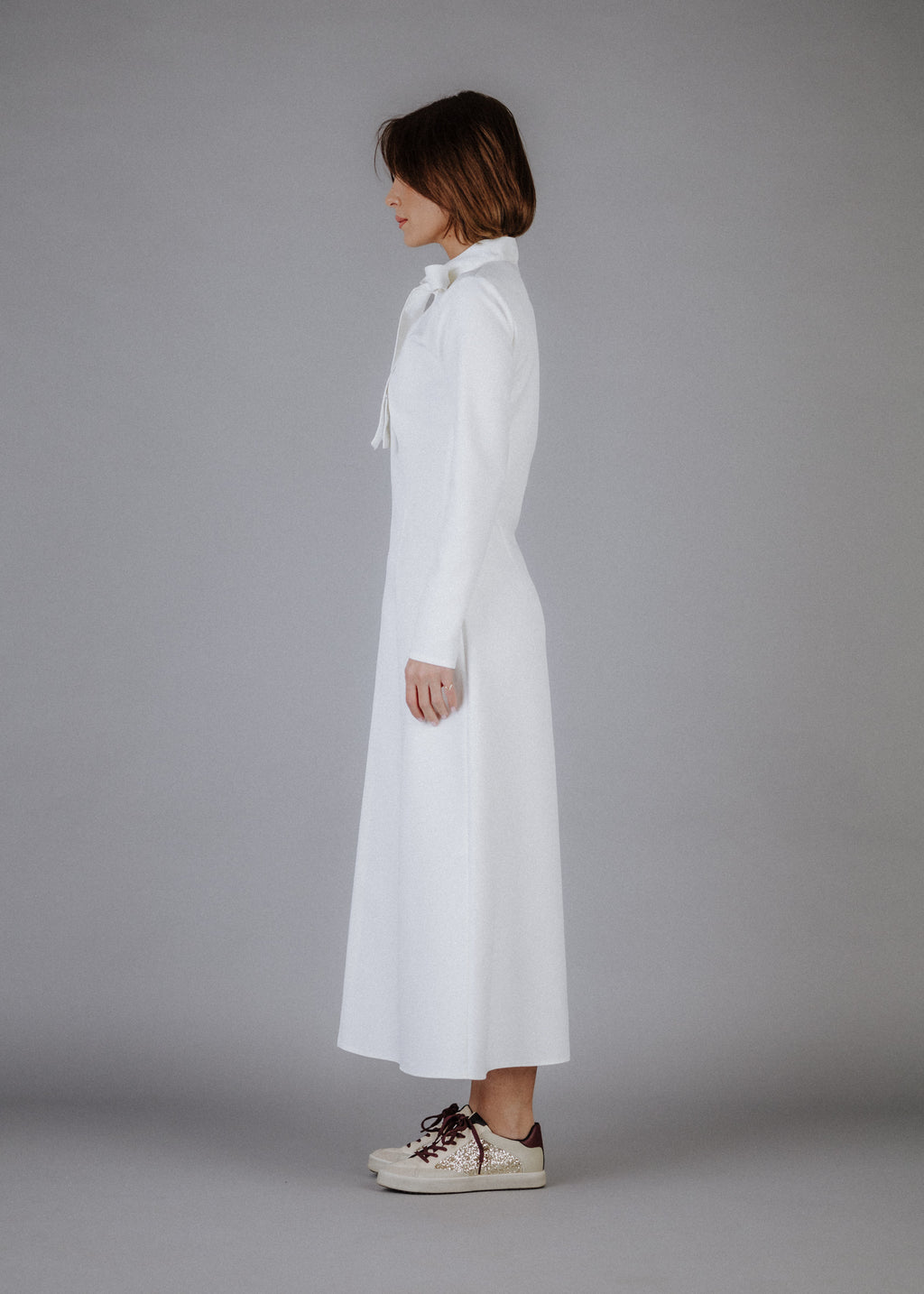 Fine fabric dress in ecru color