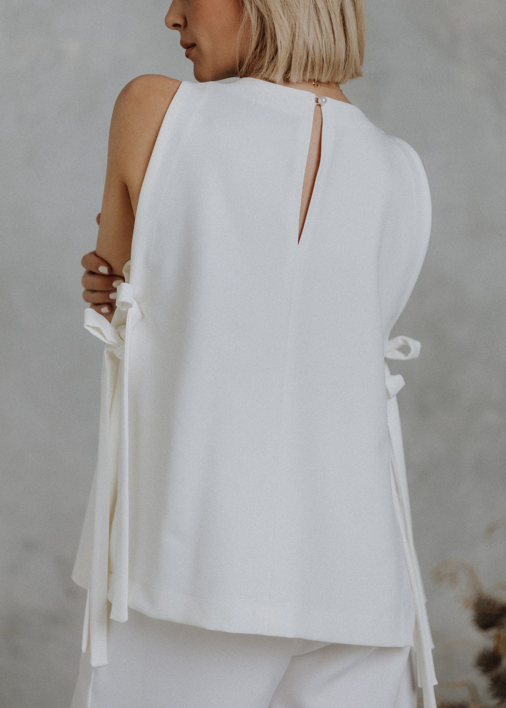 Side-open bow top in ecru