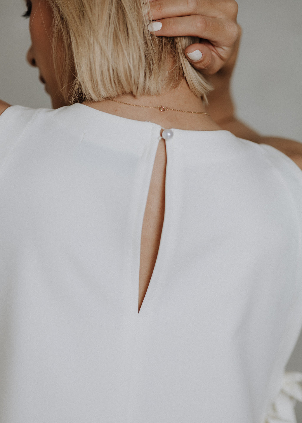 Side-open bow top in ecru