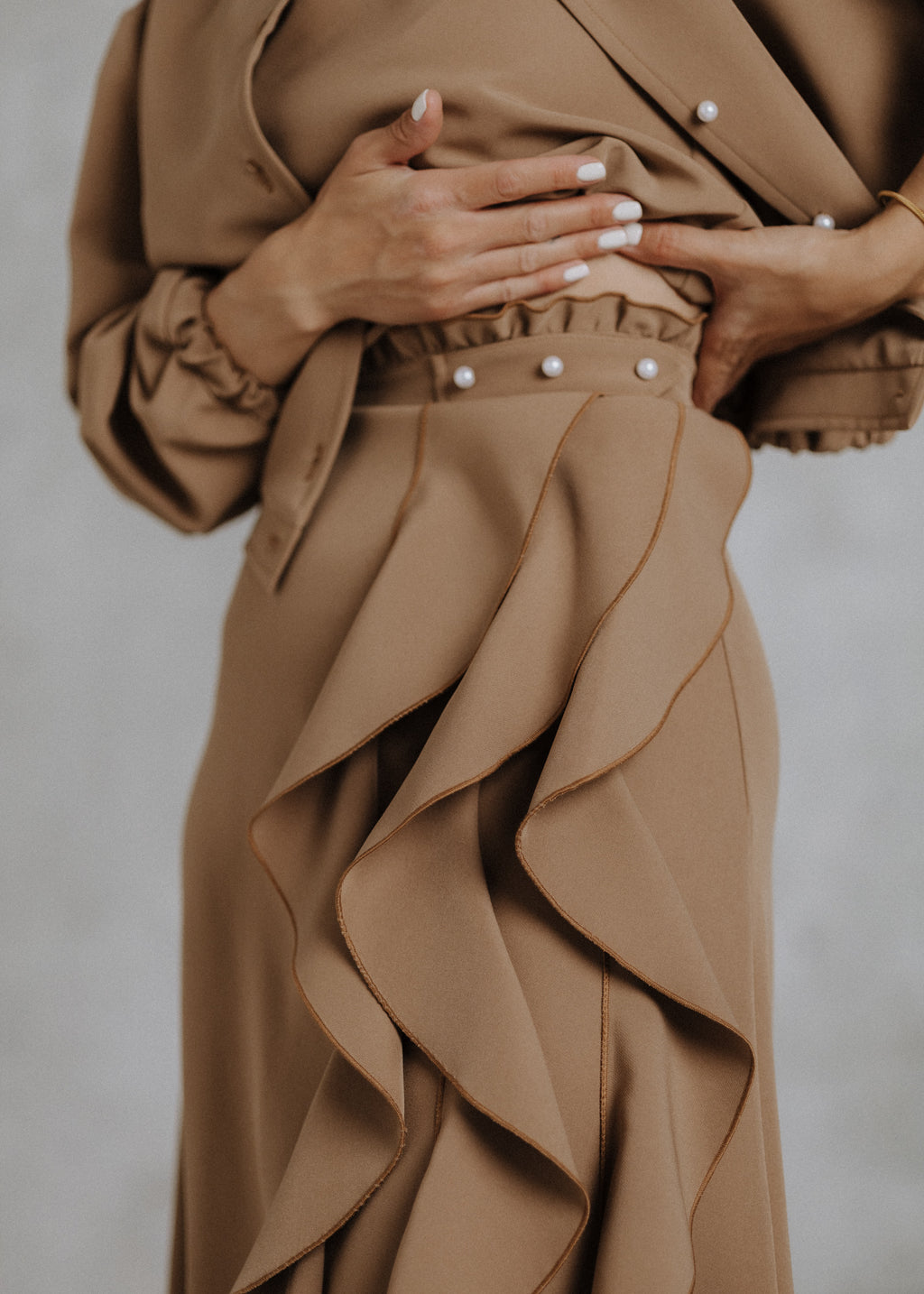 Camel colored pleated skirt