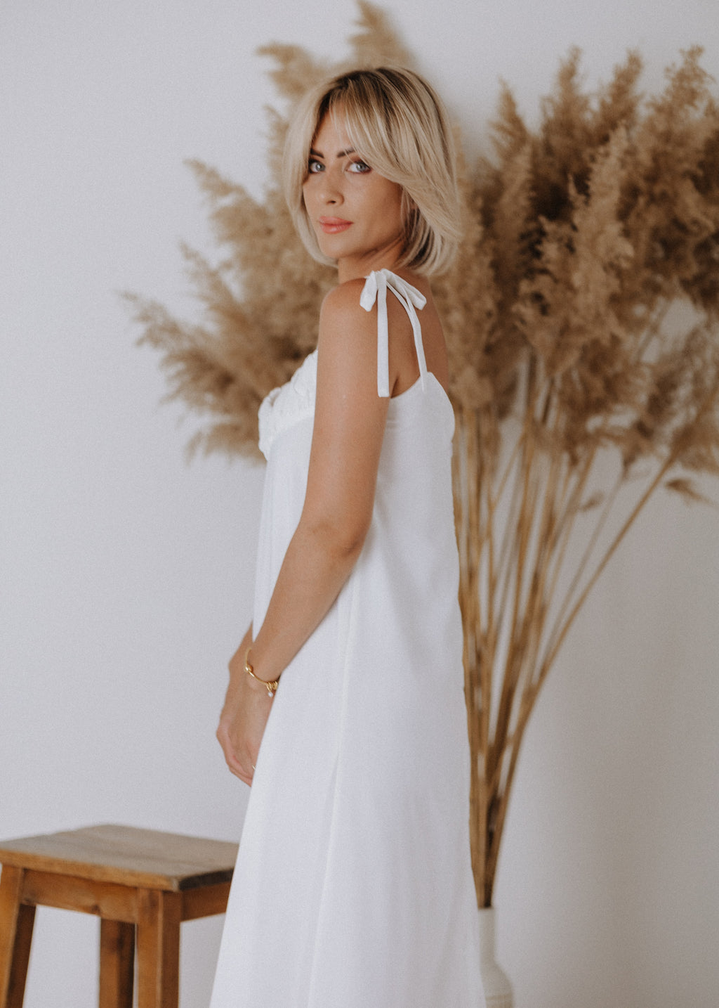 Muslin dress with gathered top in ecru