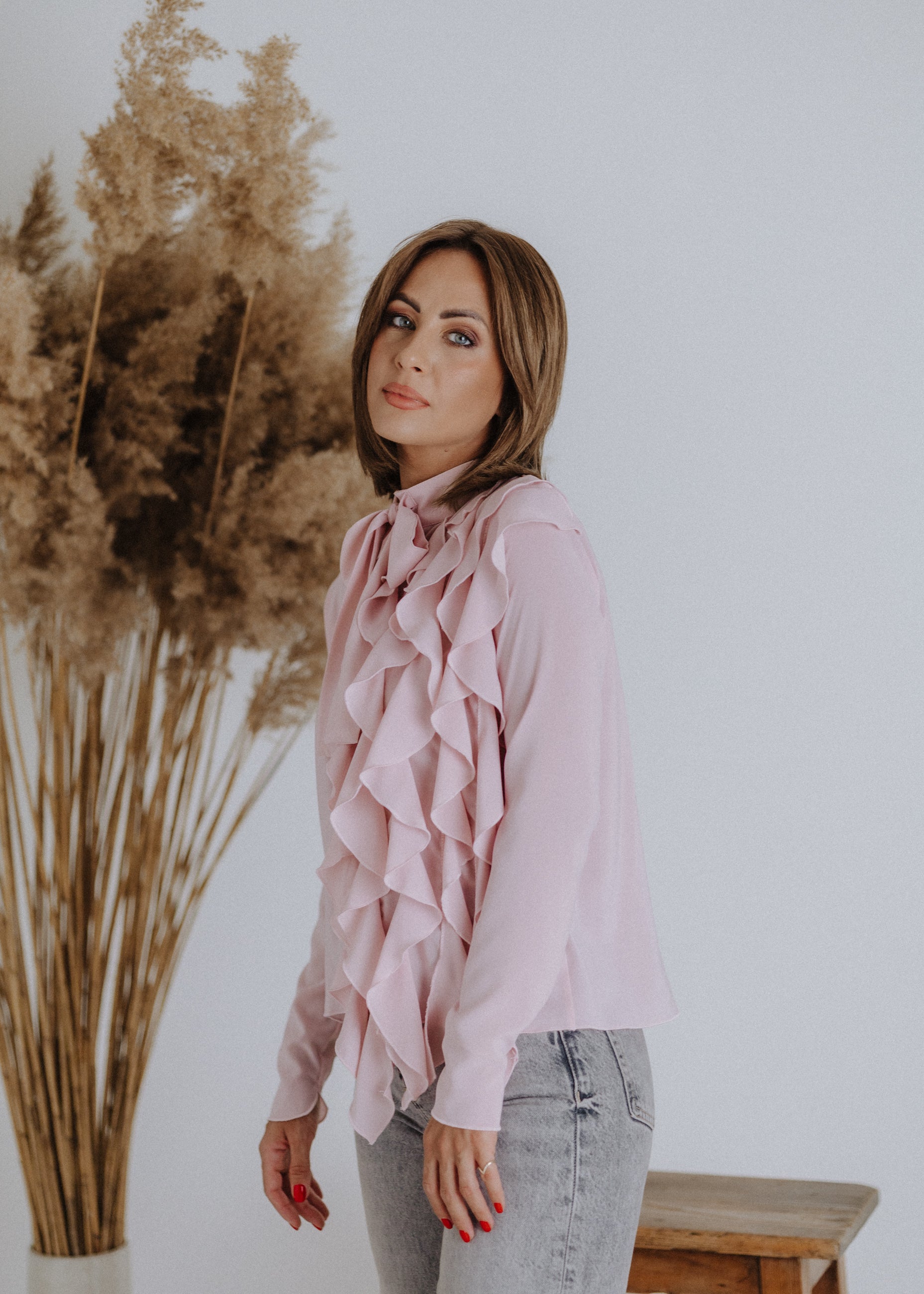 Curled ruffle blouse in powder color