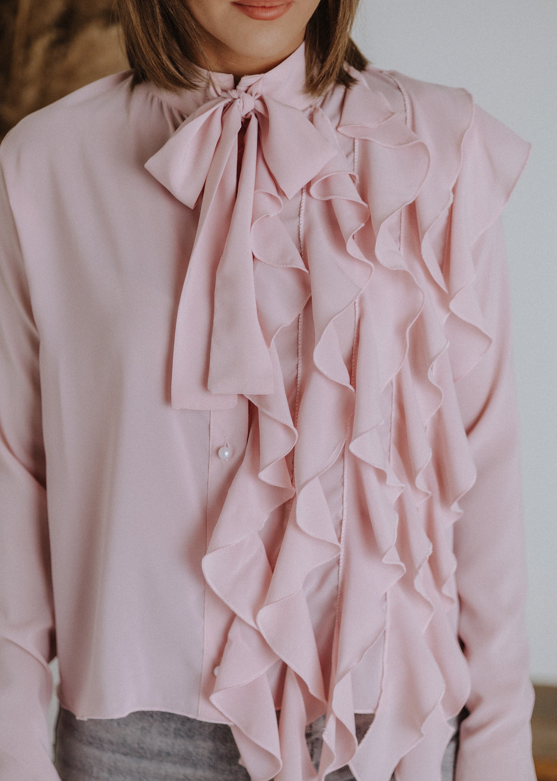 Curled ruffle blouse in powder color
