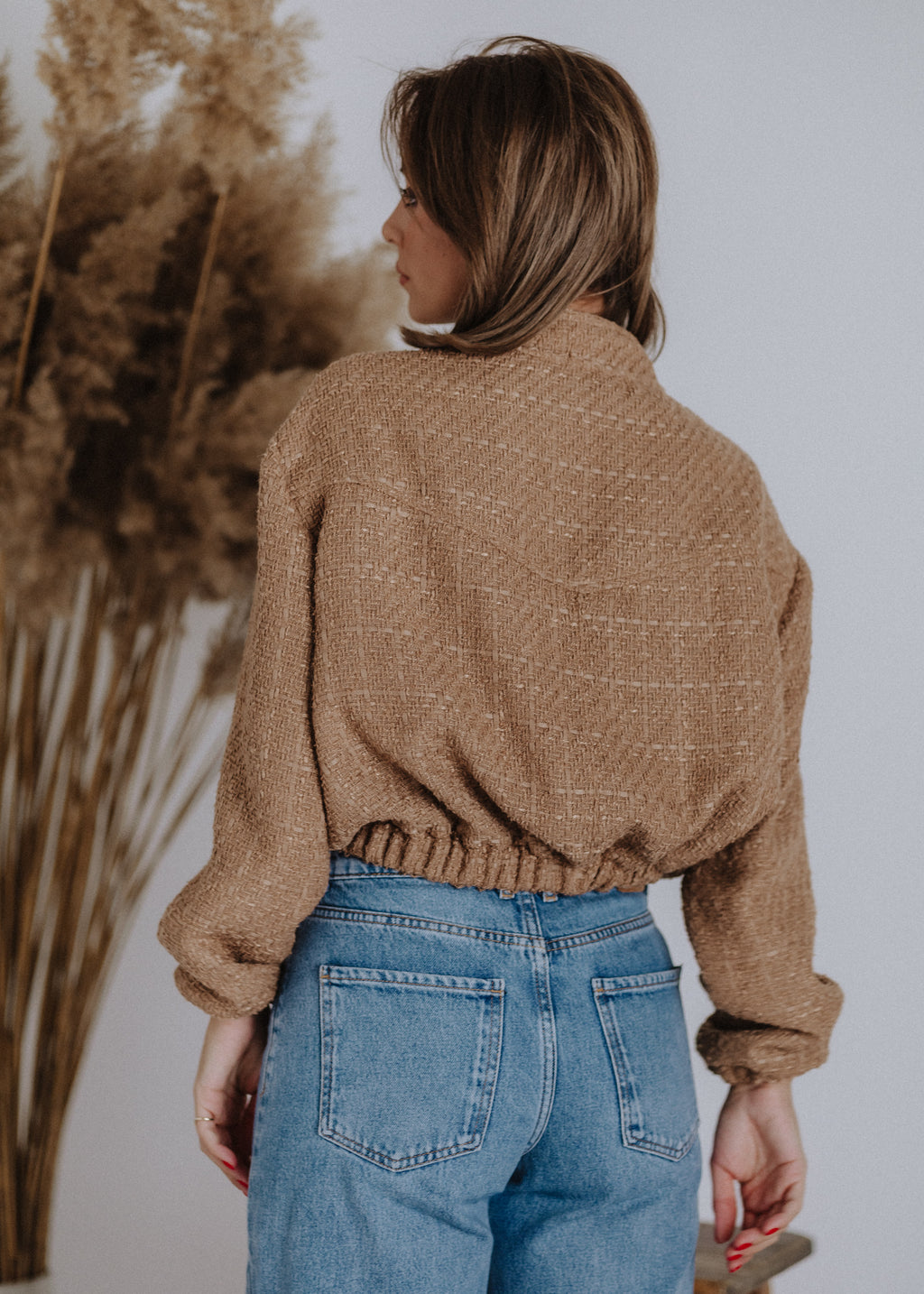 Bomber-style top made of bouclé fabric
