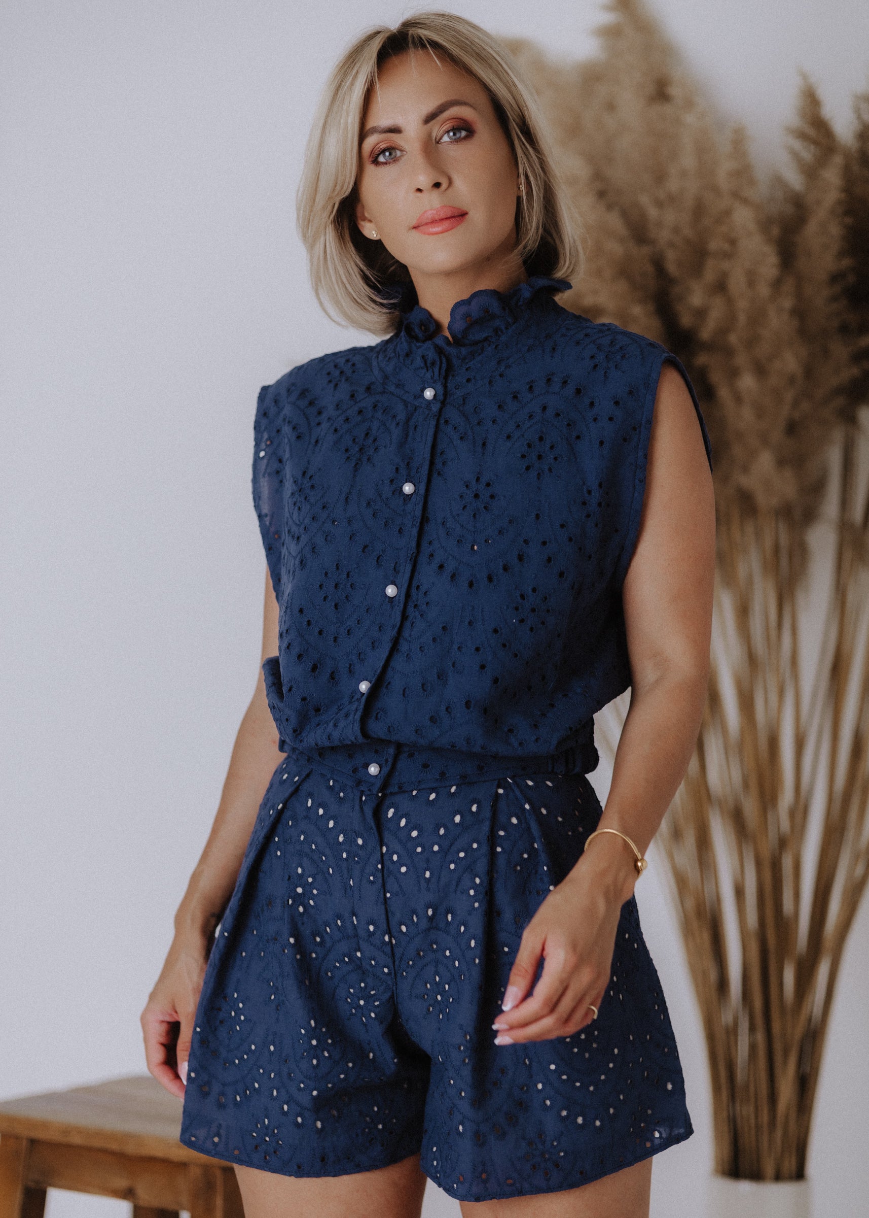 Madeira sleeveless bomber top in navy blue