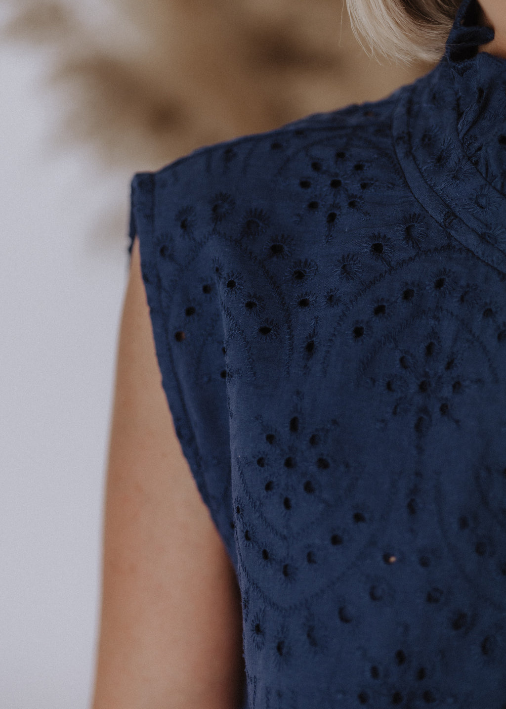 Madeira sleeveless bomber top in navy blue