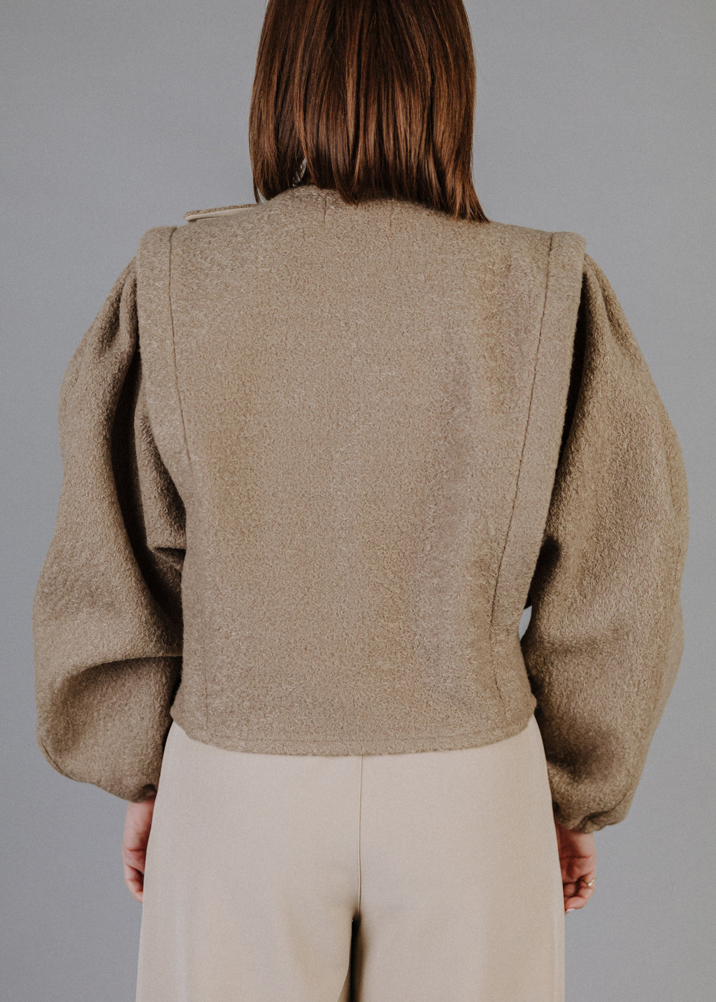 BOUCLÉ PEPLUM TOP IN TAUPE