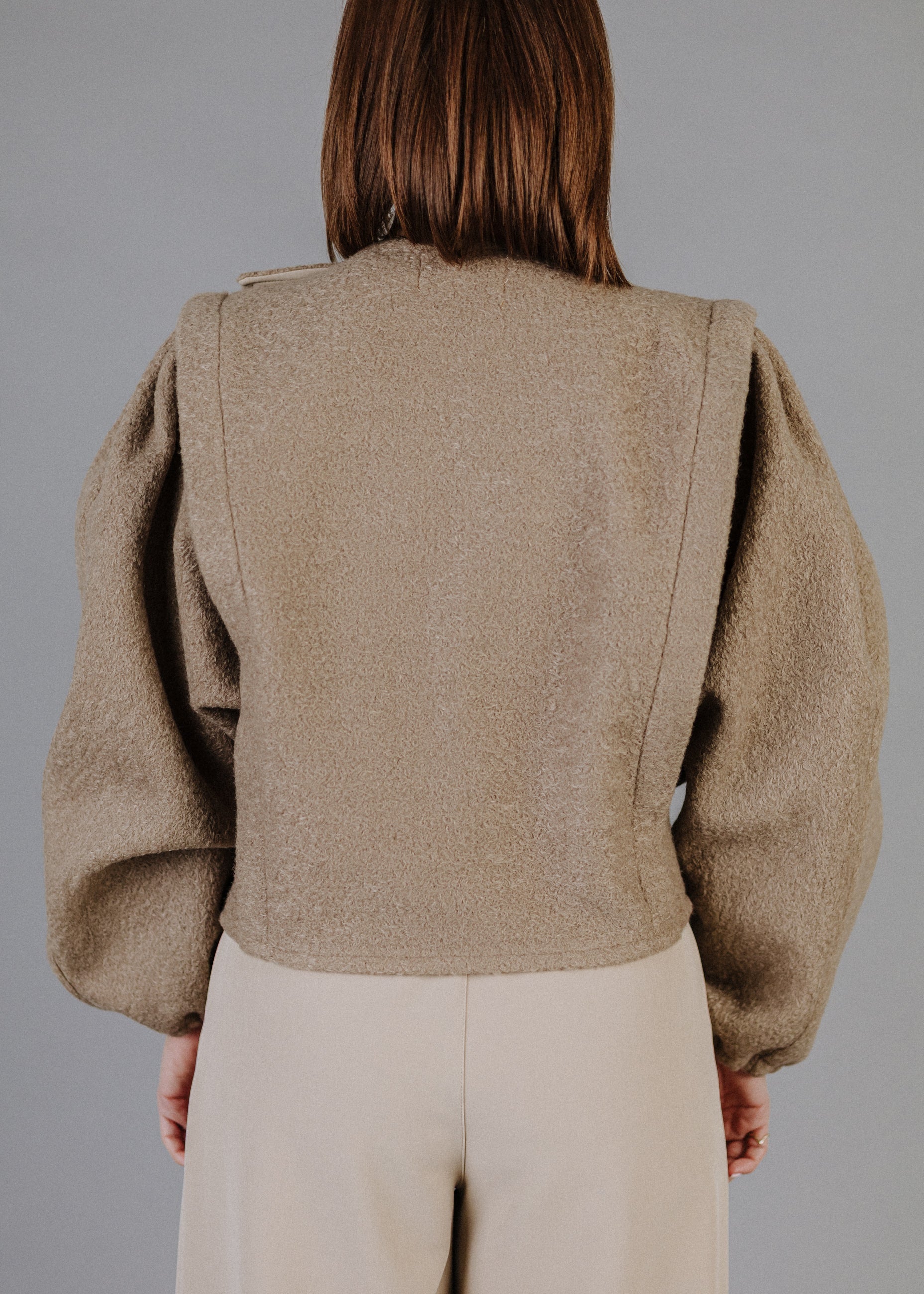 BOUCLÉ PEPLUM TOP IN TAUPE
