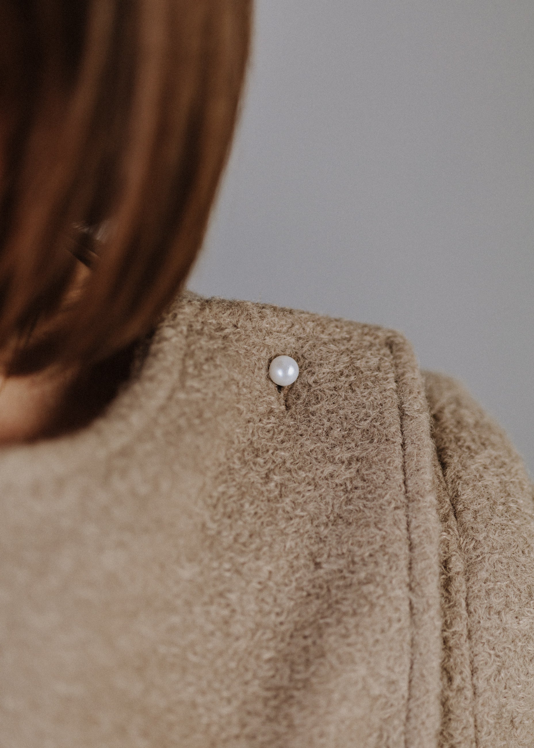 BOUCLÉ PEPLUM TOP IN TAUPE