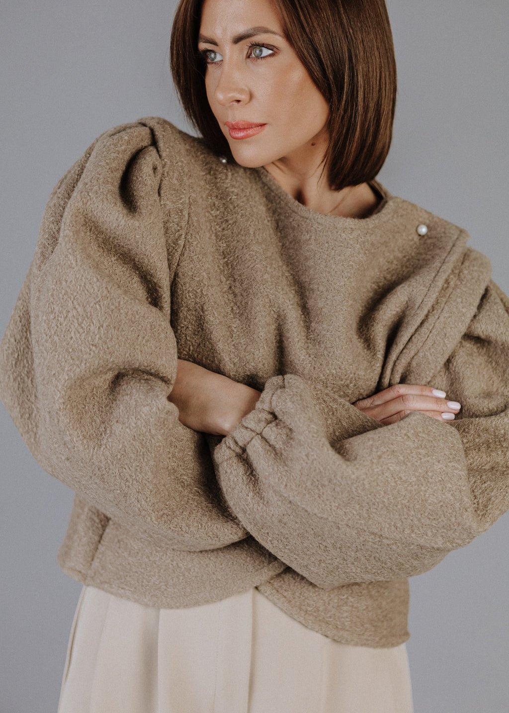 BOUCLÉ PEPLUM TOP IN TAUPE