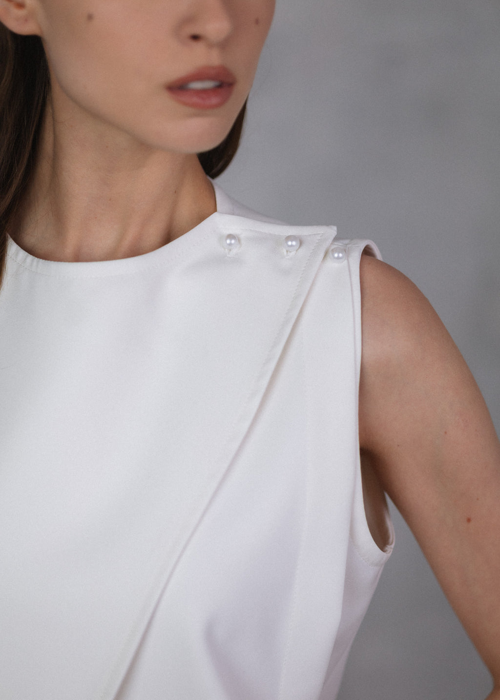 Sleeveless wrap top in ecru
