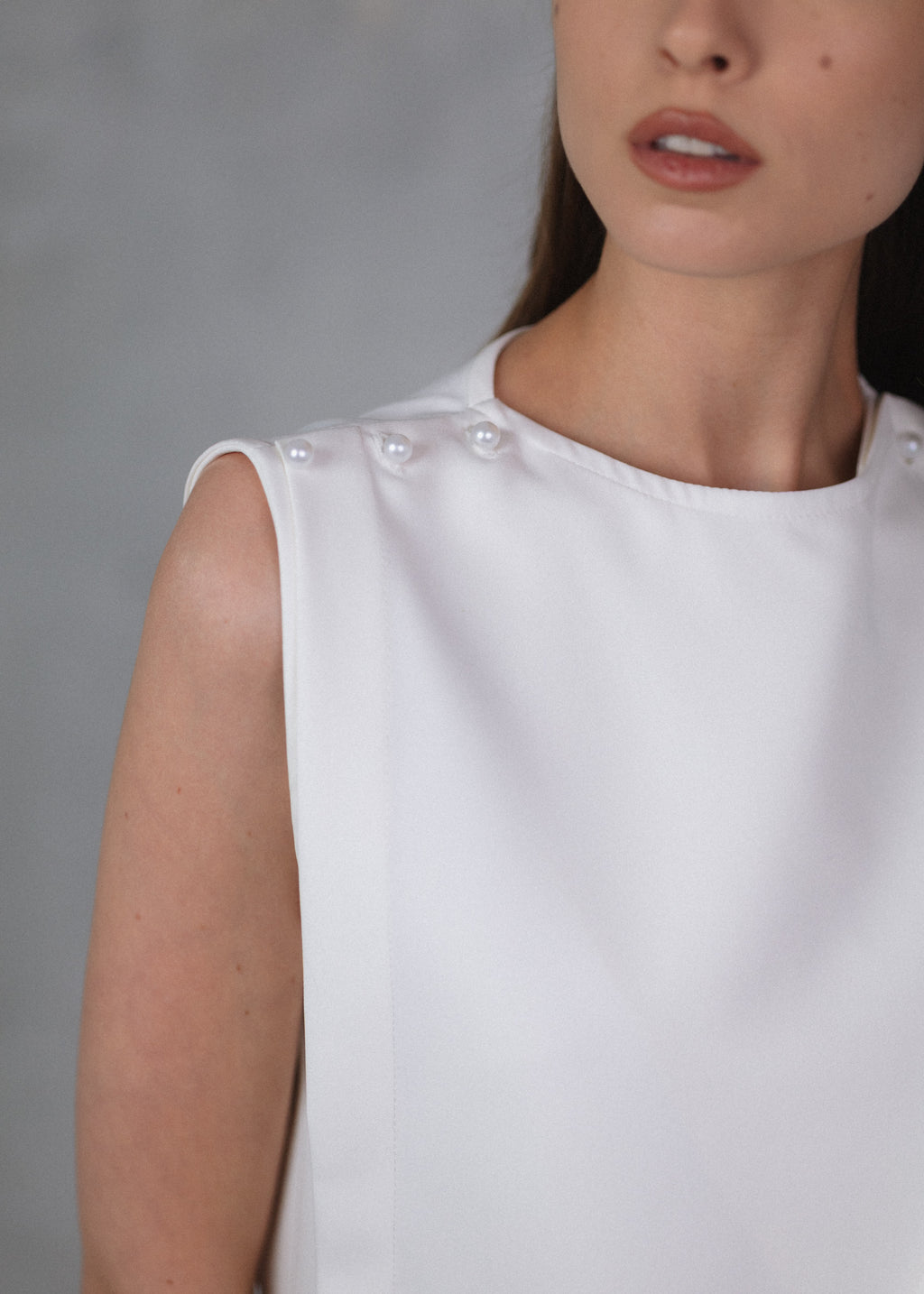 Sleeveless wrap top in ecru