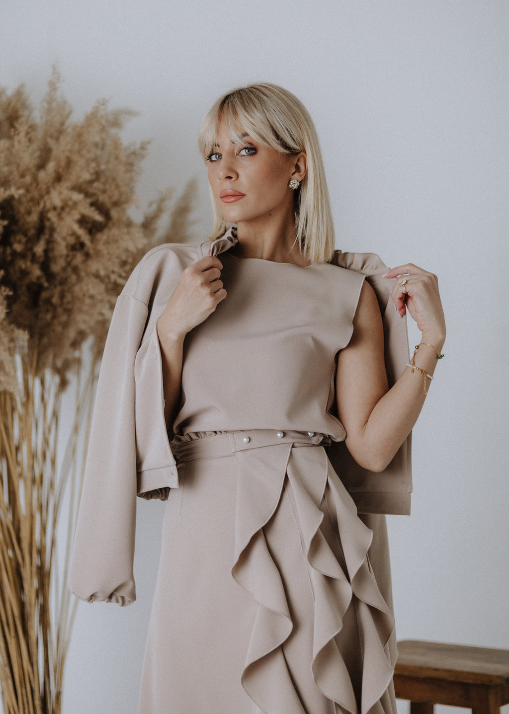 Sleeveless fabric top in taupe color